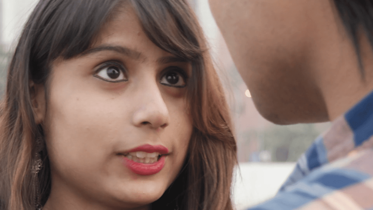 close-up-of-young-couple-talking-smiling-and-in-love-in-public-park_rfv6eak-1524503545687.png