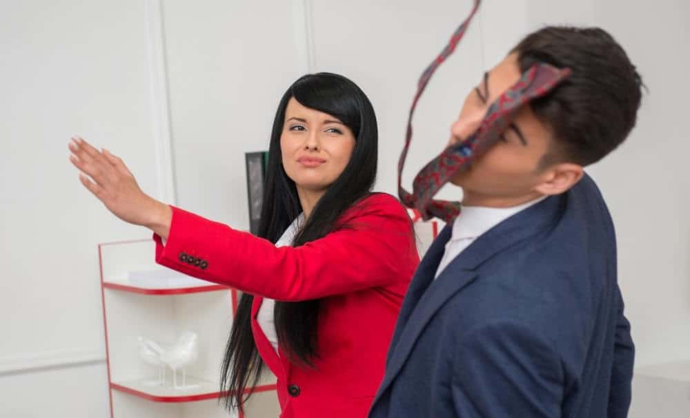 woman-in-red-slapping-man-in-suit-1528845775491.jpg