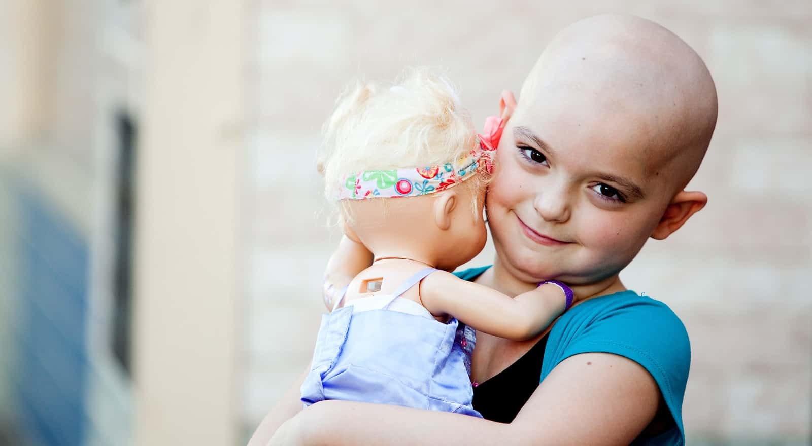zoey-with-baby-doll-1526849175605.jpg
