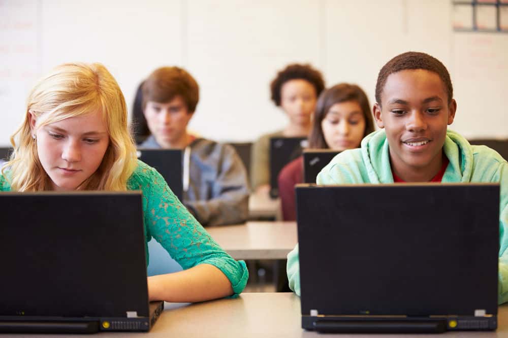 secondary-school-students-on-laptops-1534277640238.jpg