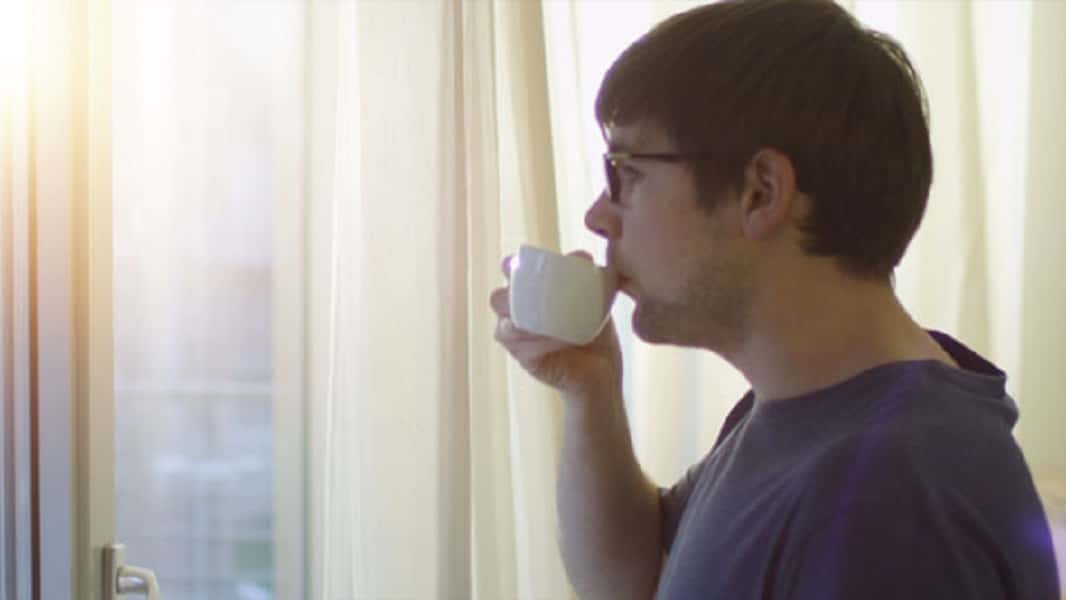 15_016_15_man_looking_in_the_window_at_morning-1535383245650.jpg