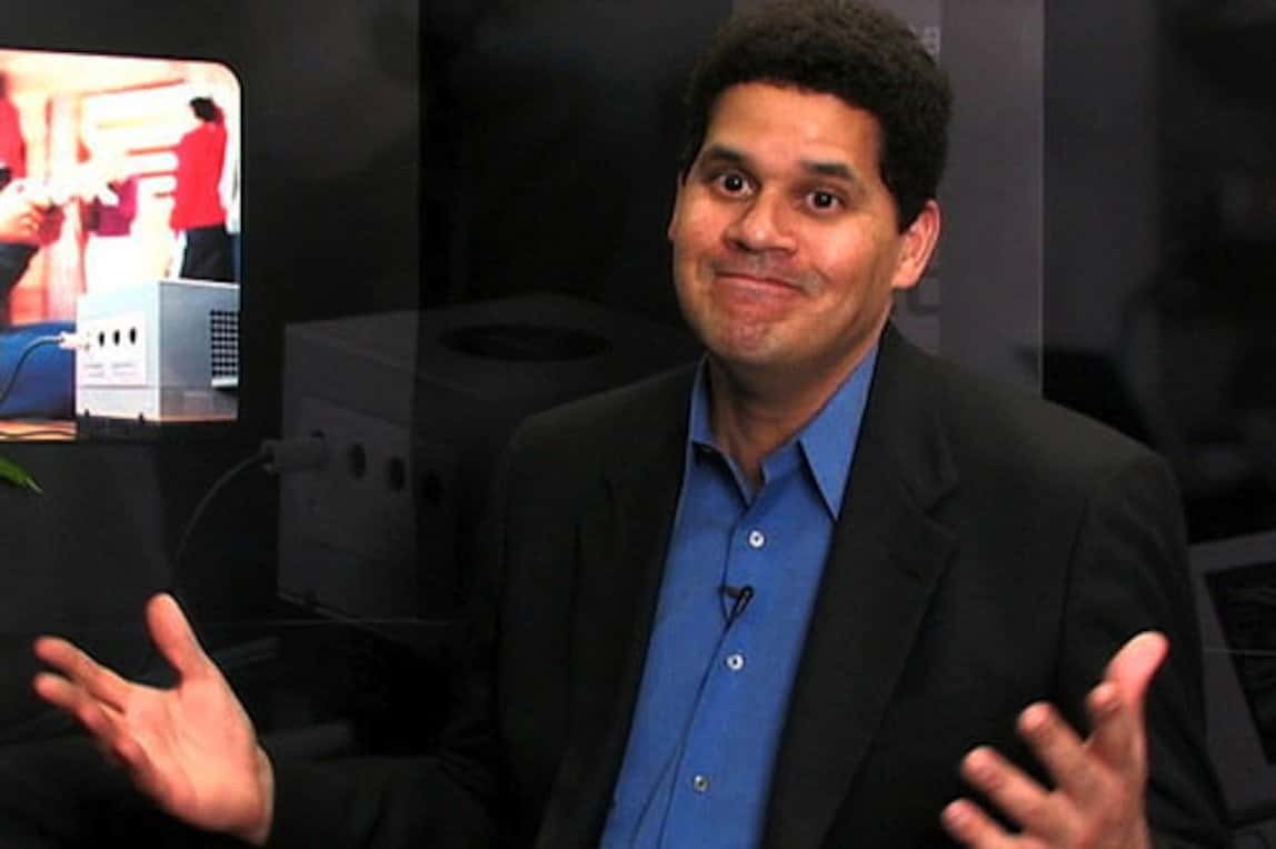 reggie-fils-aime-shrug-1541464154801.jpg