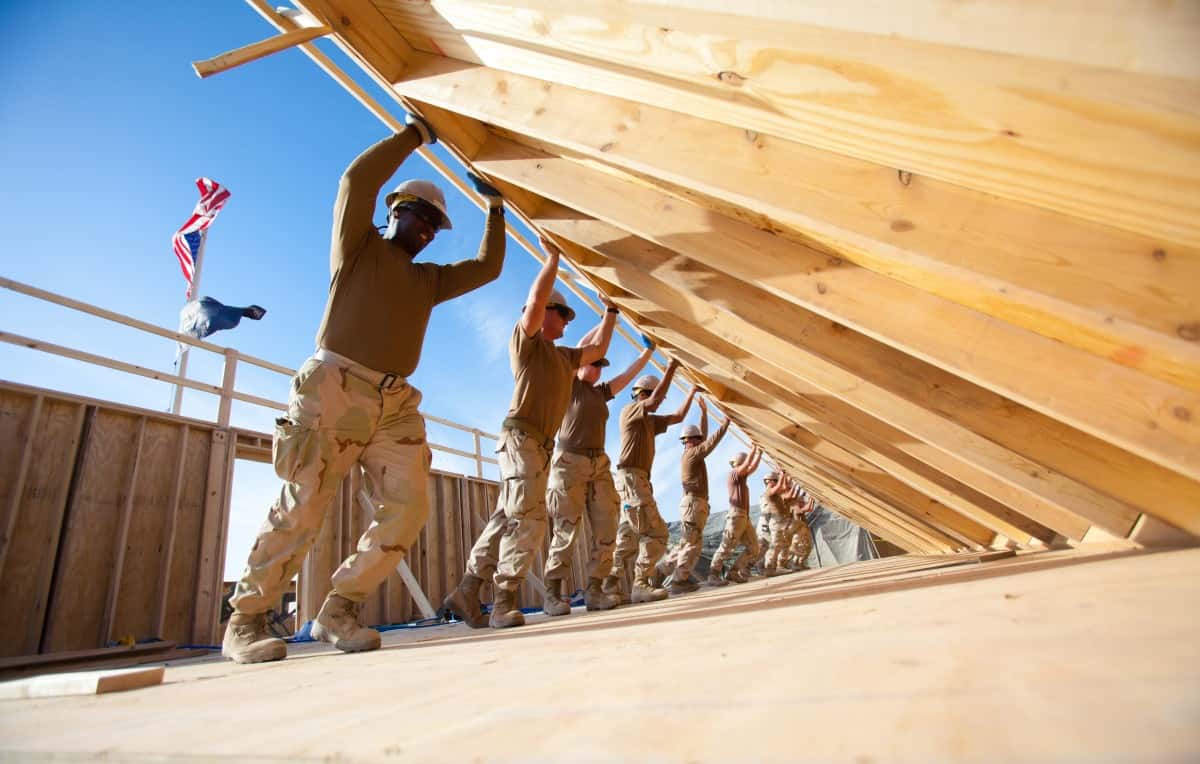 teamwork_team_construction_building_build_home_men_group-913053-1552435151265.jpg