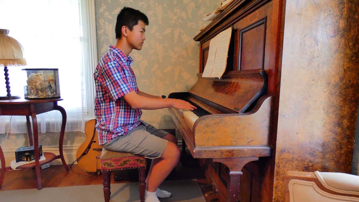 boy-old-piano-piano-1635257-1556768196671.jpg