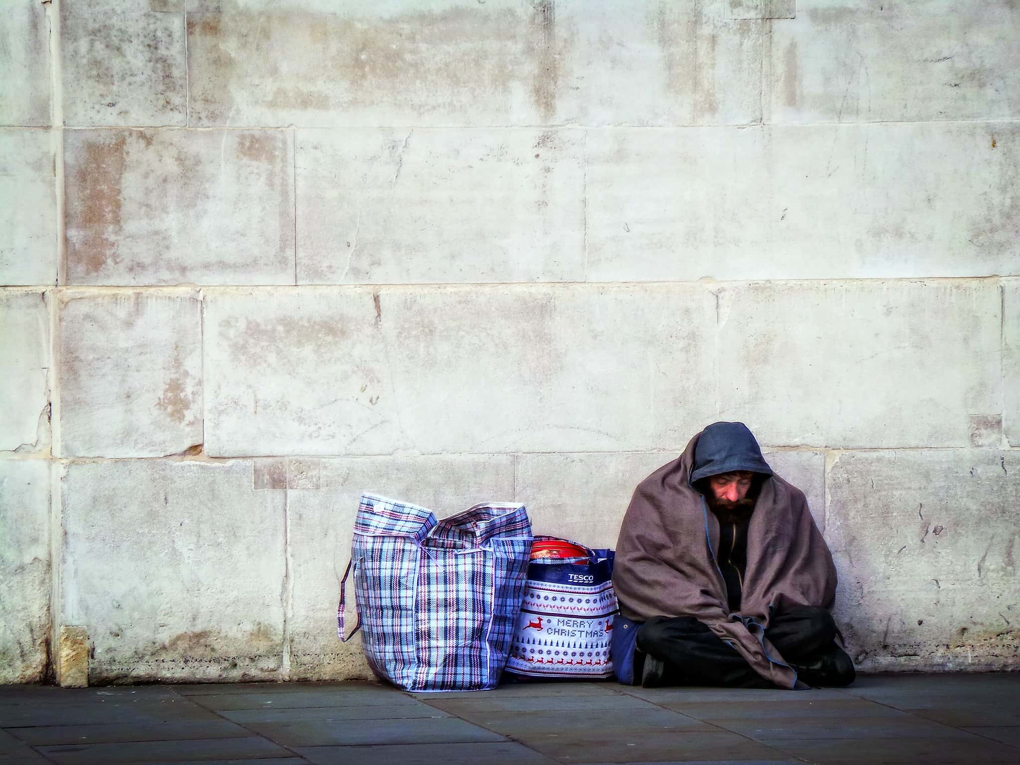 Homeless by a Wall