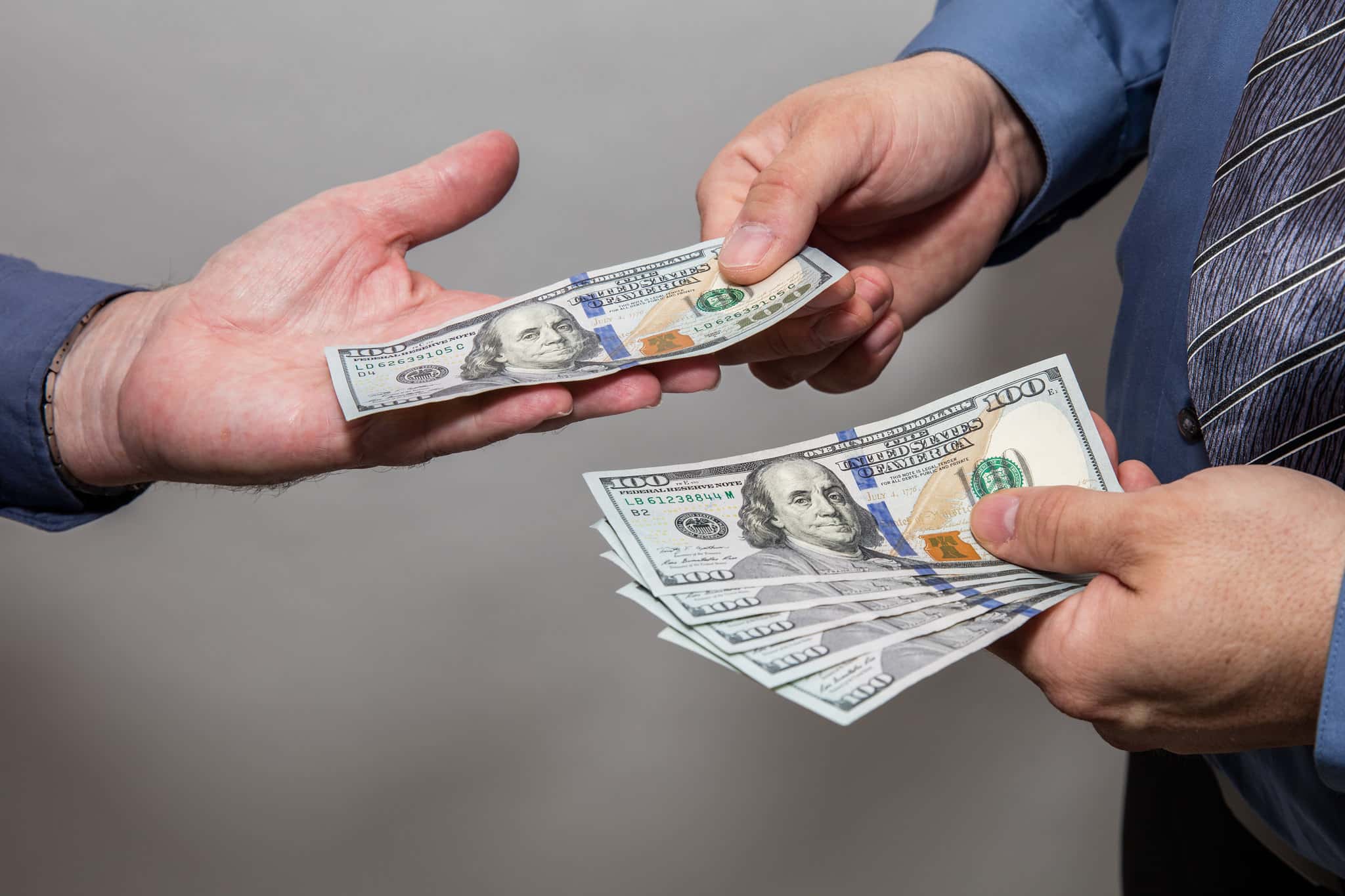 Human Hands Exchanging Money 2