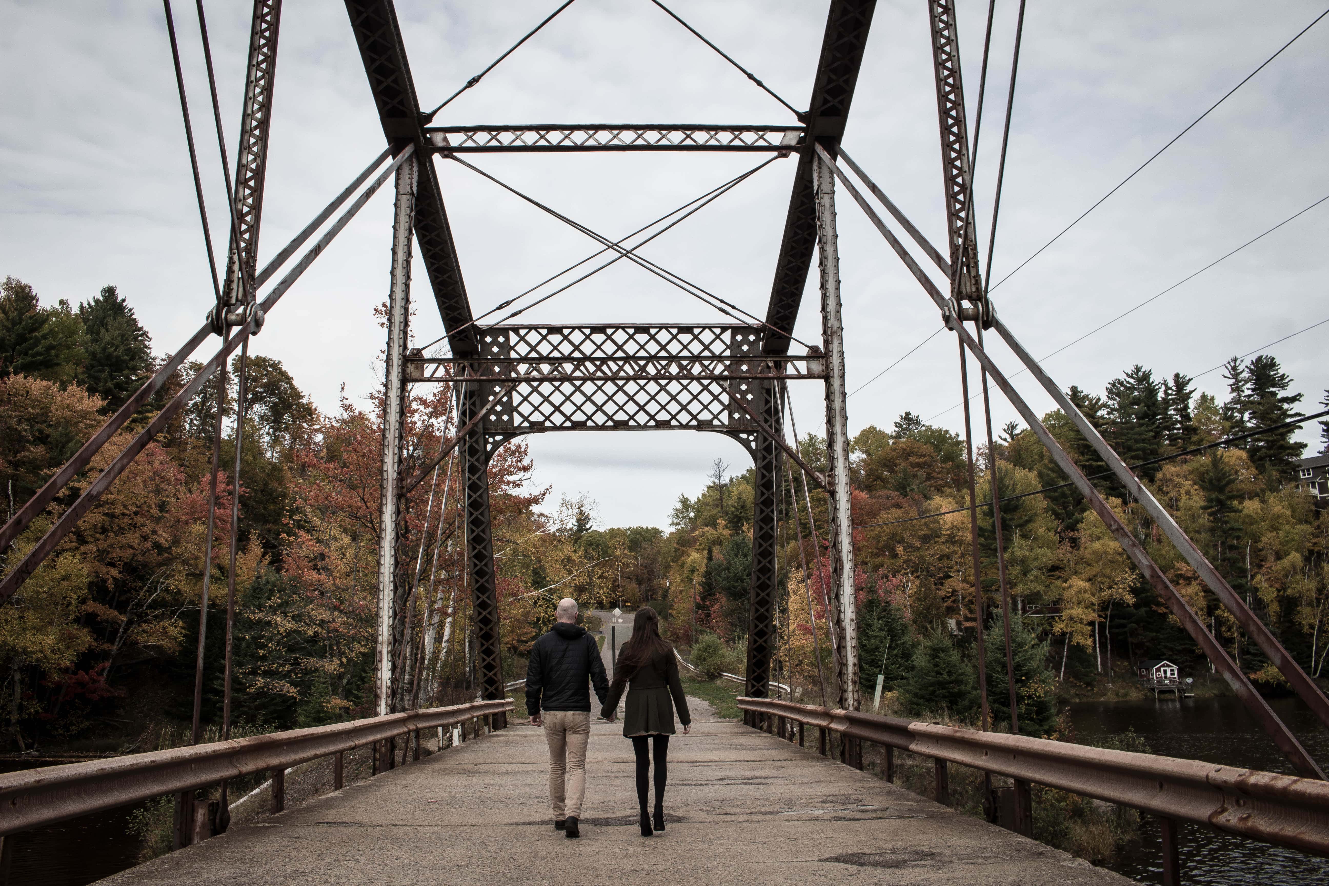 Canva - Couple Walking on Gray Bridge at Daytime