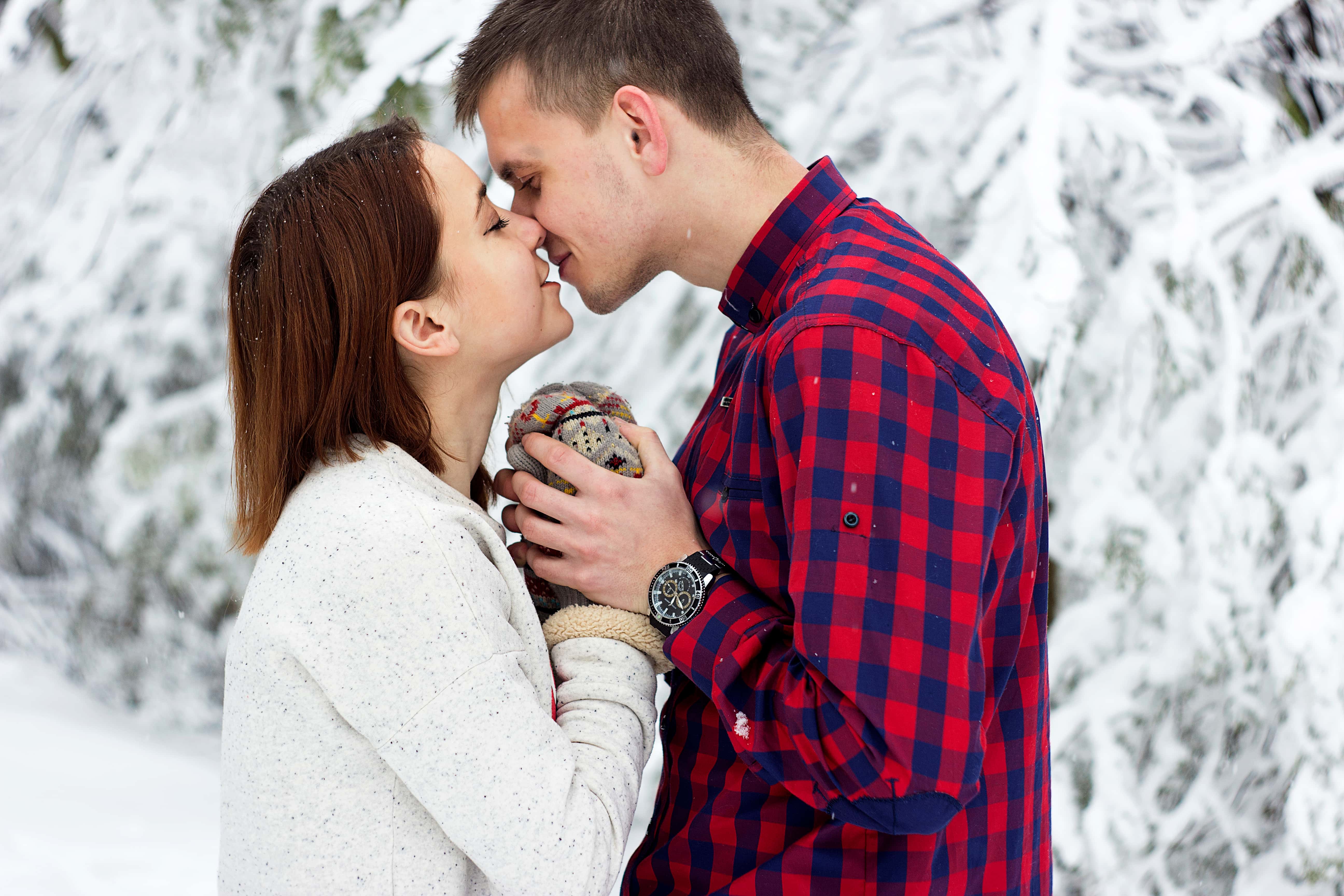 Canva - Man and Woman Kissing Each Other