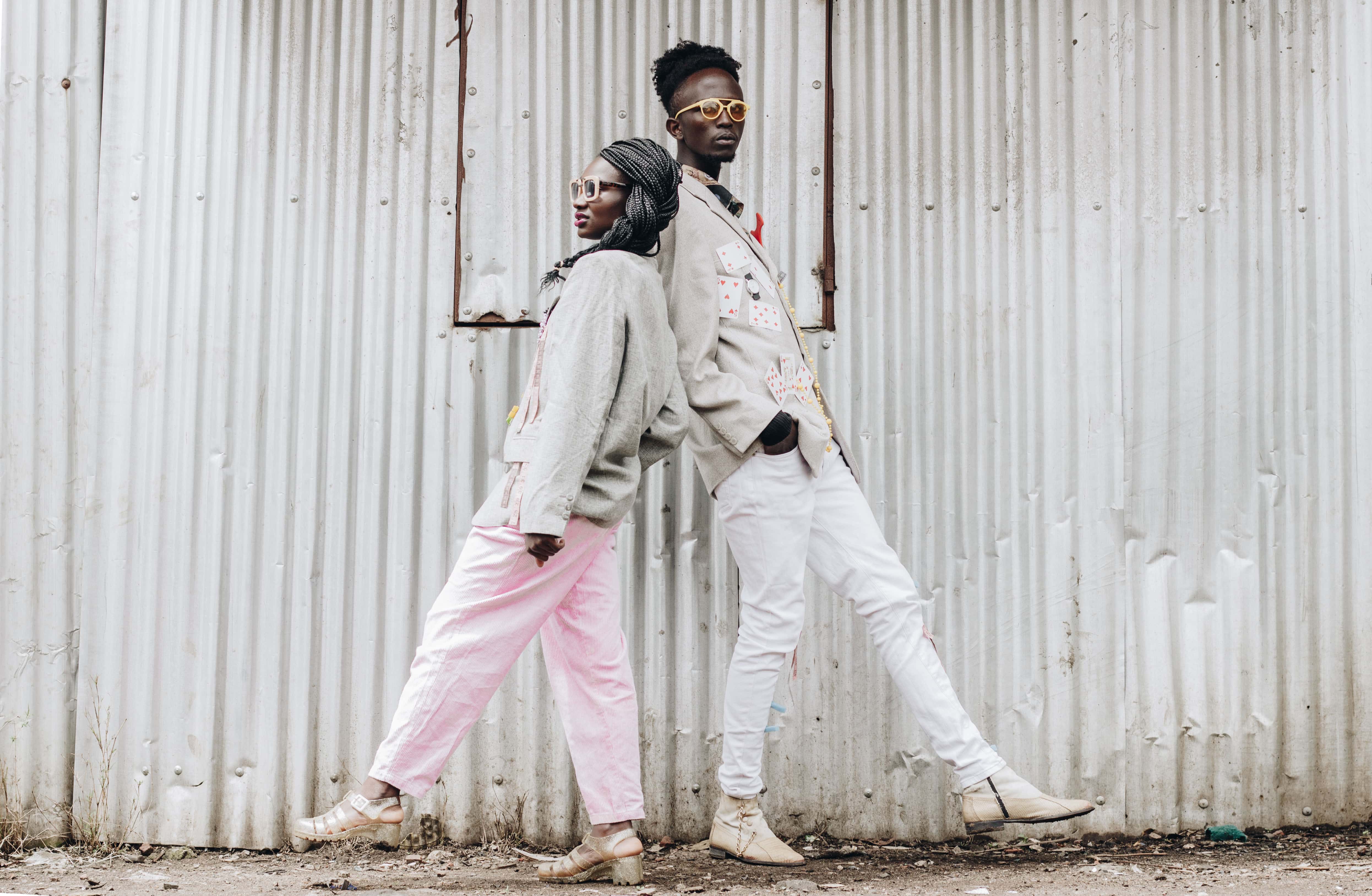 Canva - Man and Woman Standing Back to Back