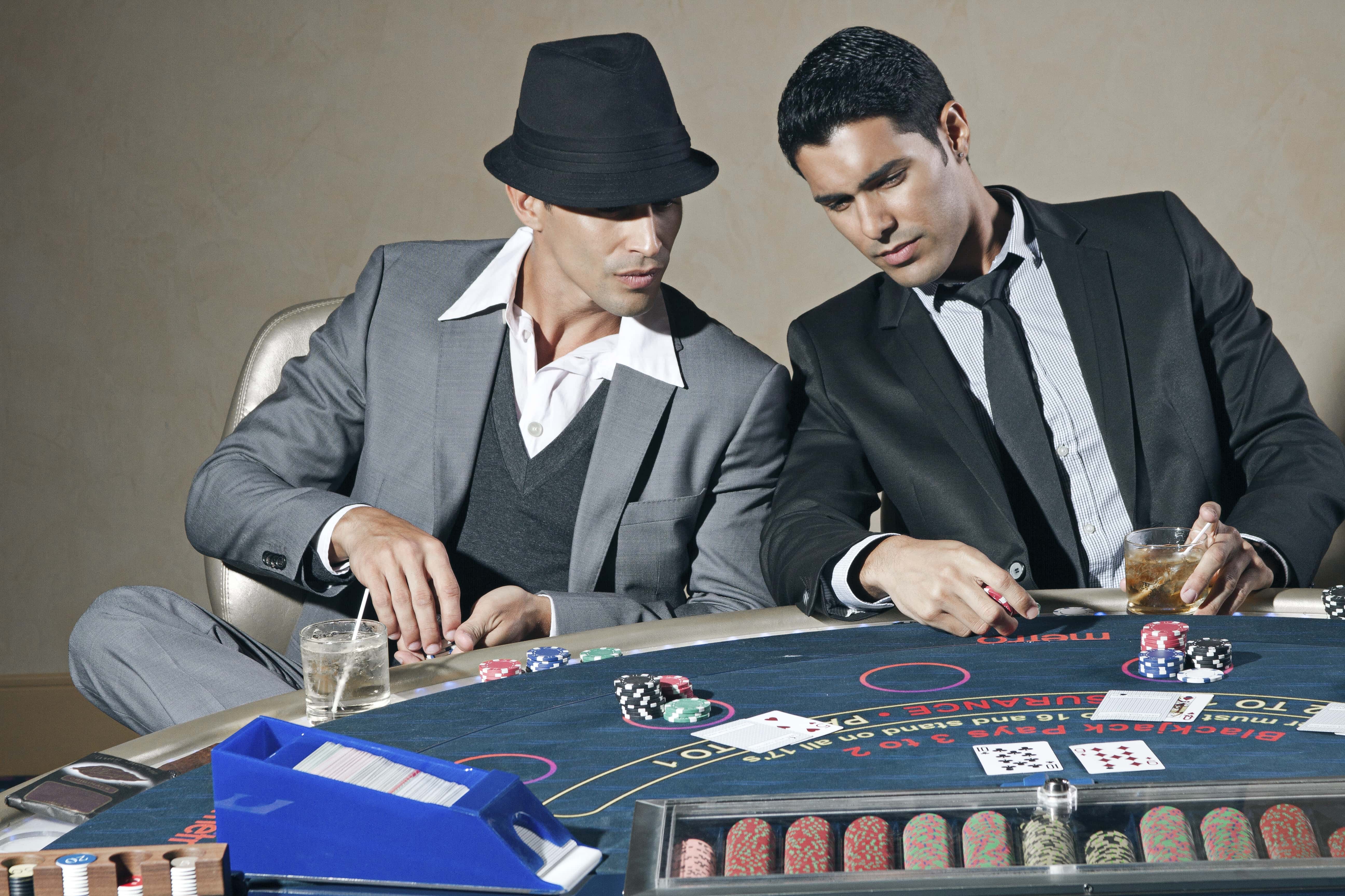 Canva - Men Playing Poker