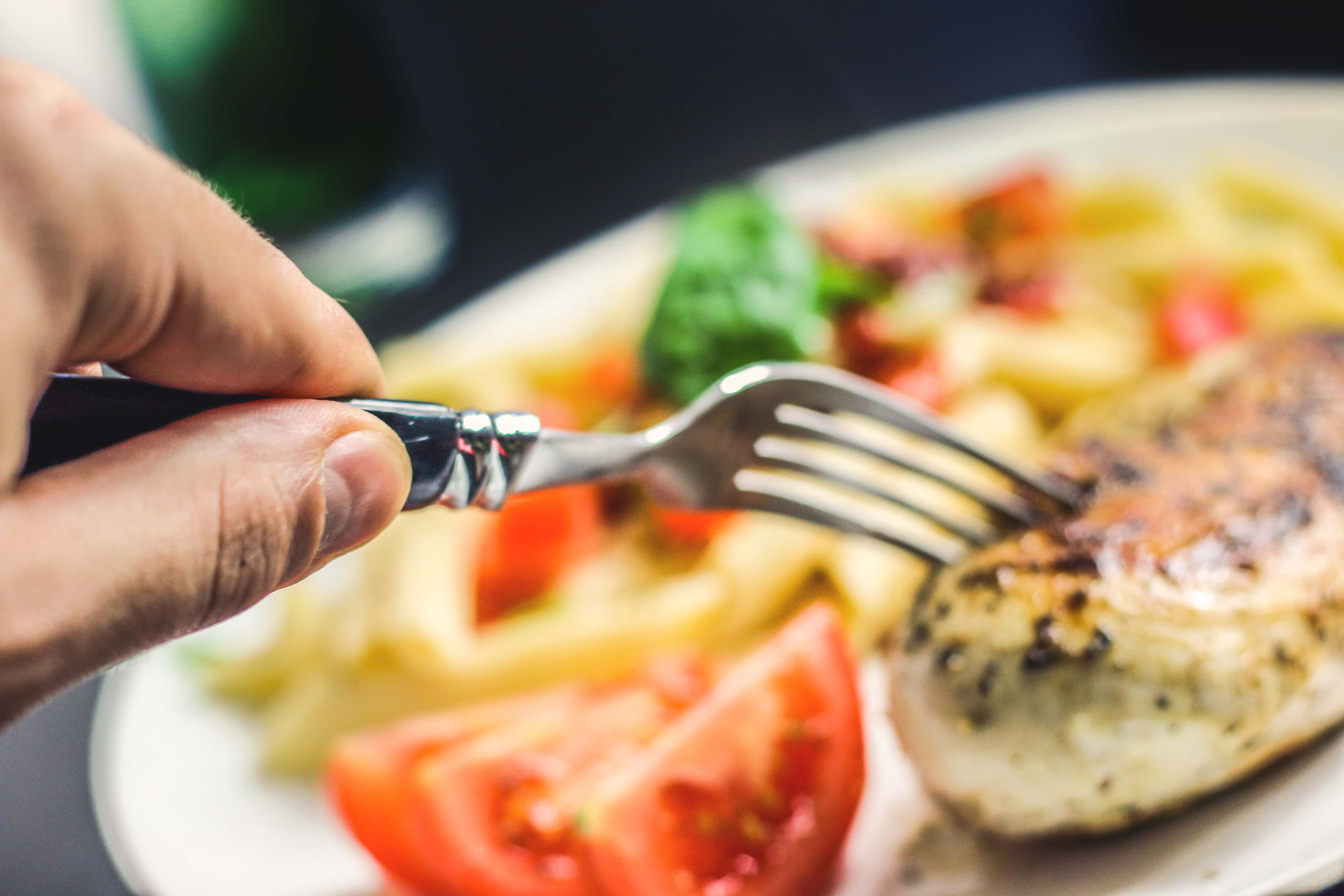 Canva - Person Holding Silver Fork