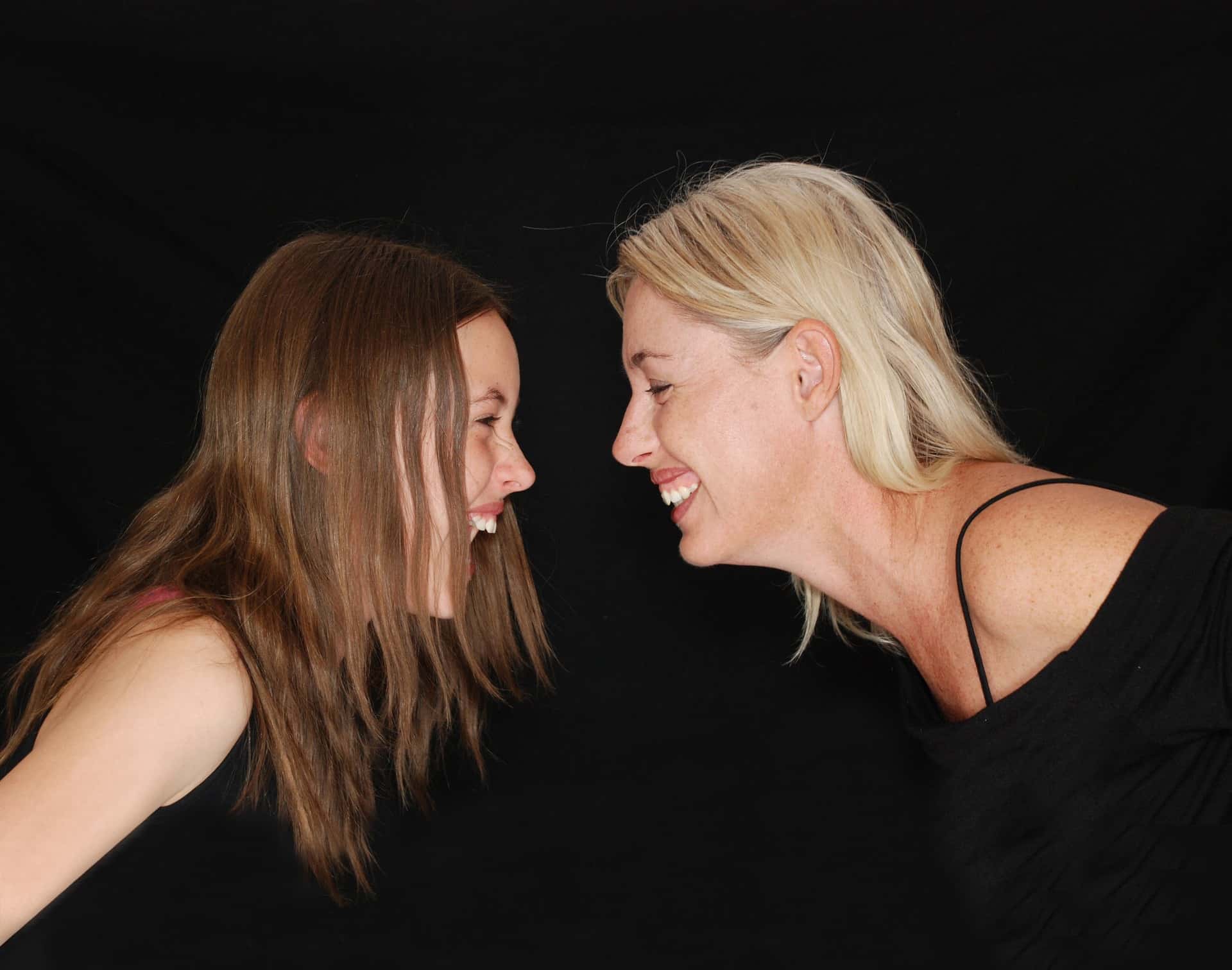 Canva - Two Women Laughing