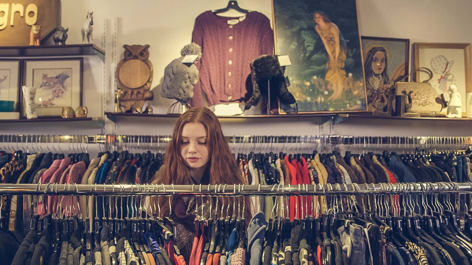 Canva - Woman Looking at Clothes in the Rack