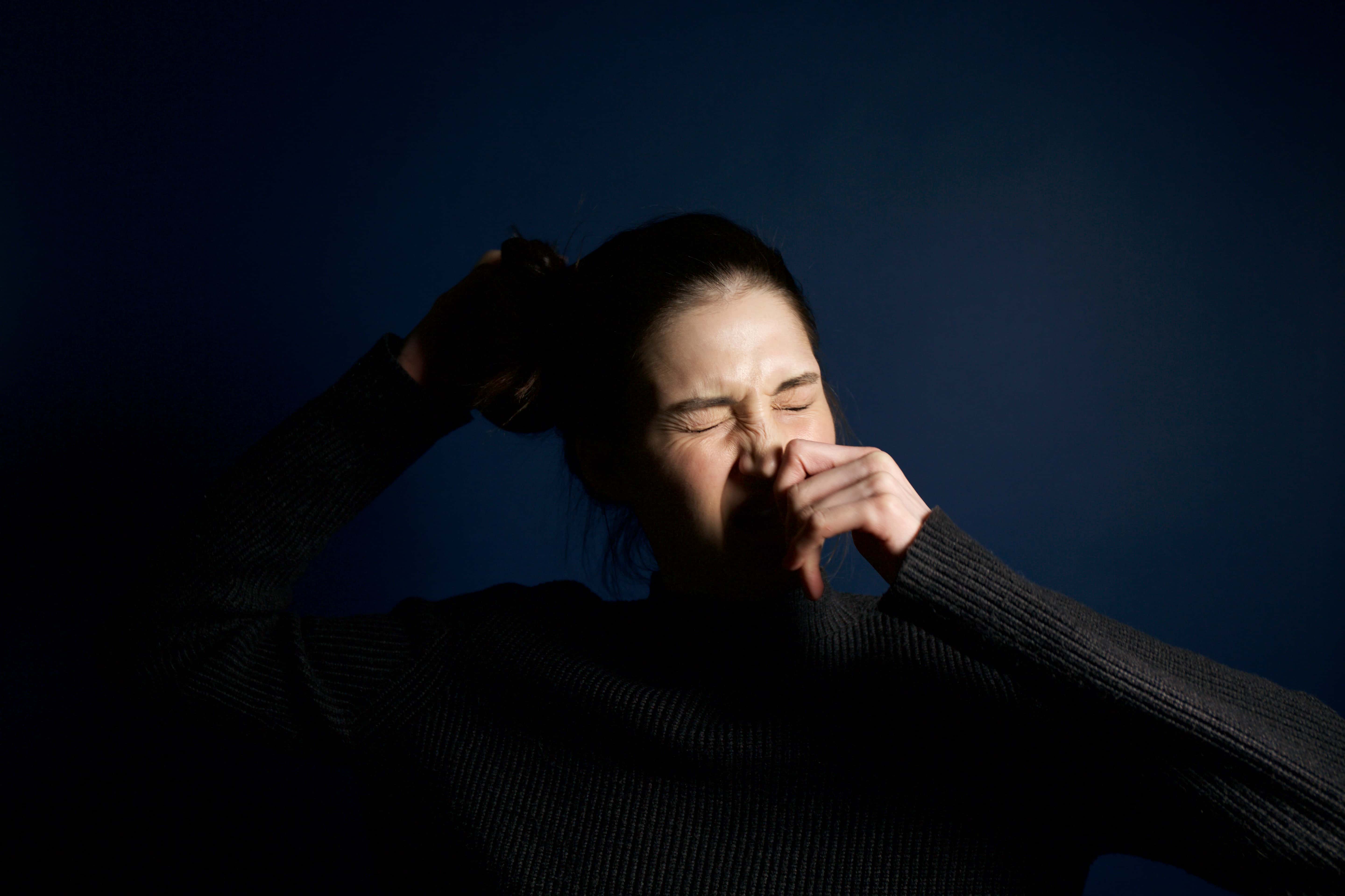 Canva - Woman Touching Her Nose