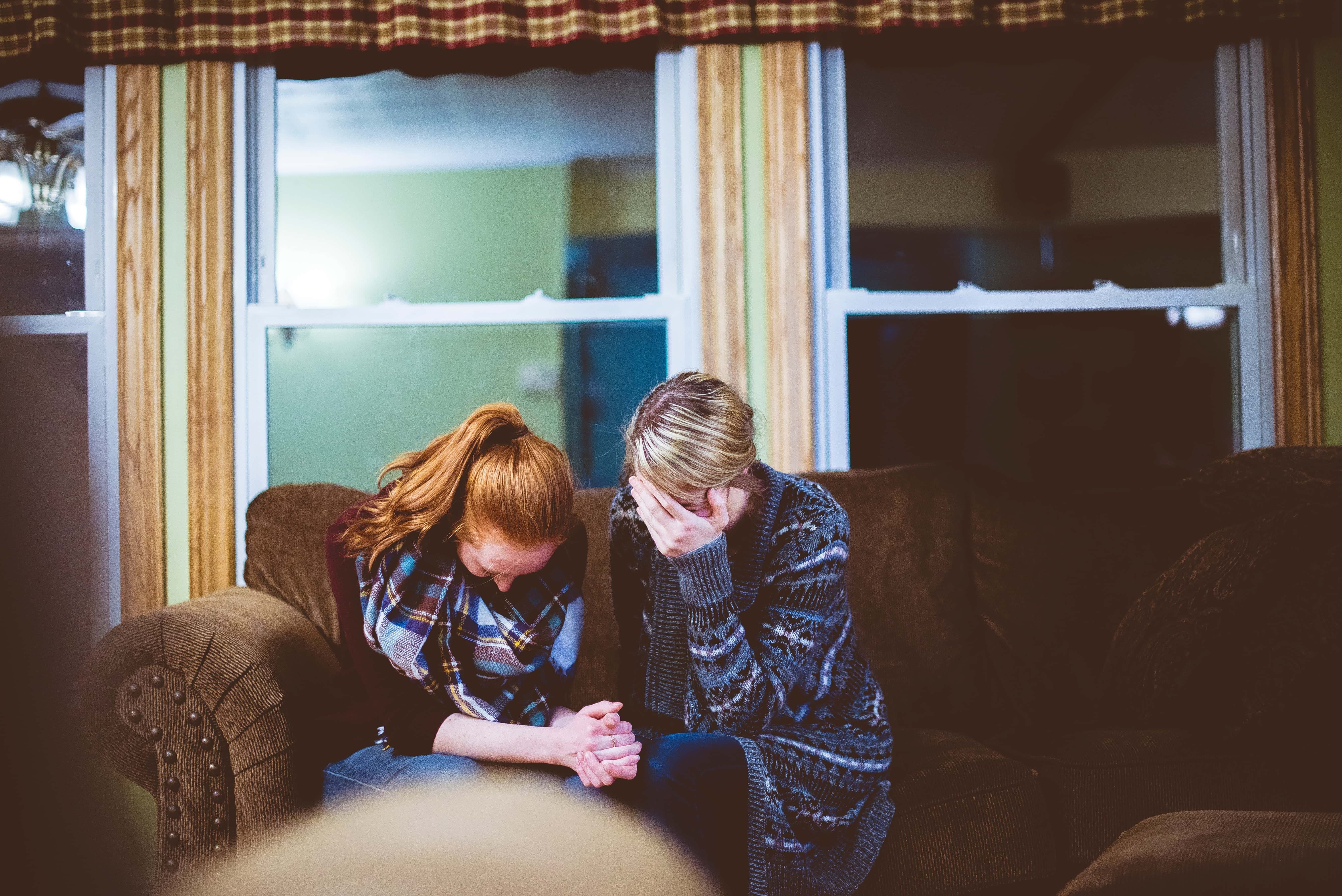 Canva - Women Crying on Sofa at Home