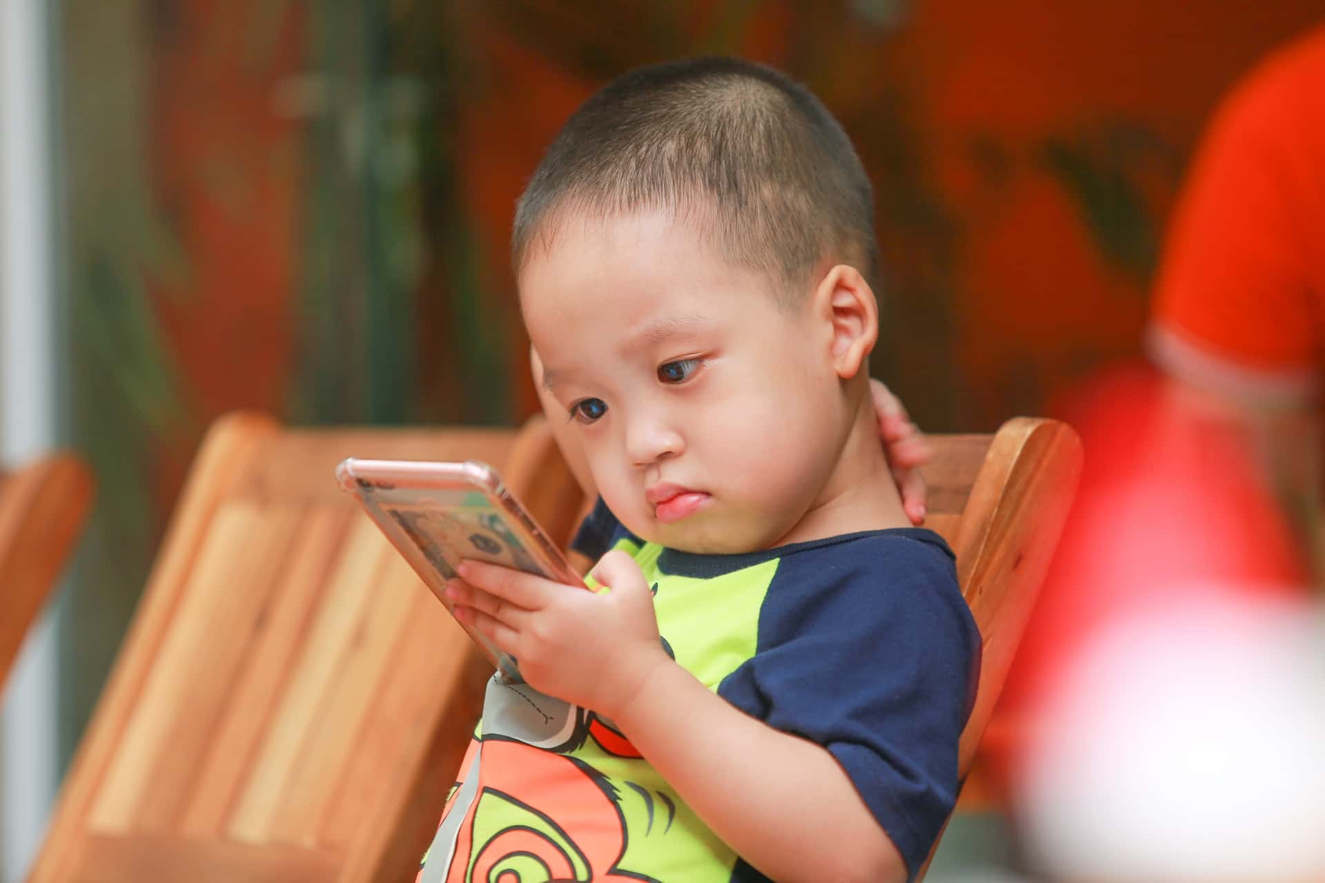 blurred-background-boy-cellphone-2181423