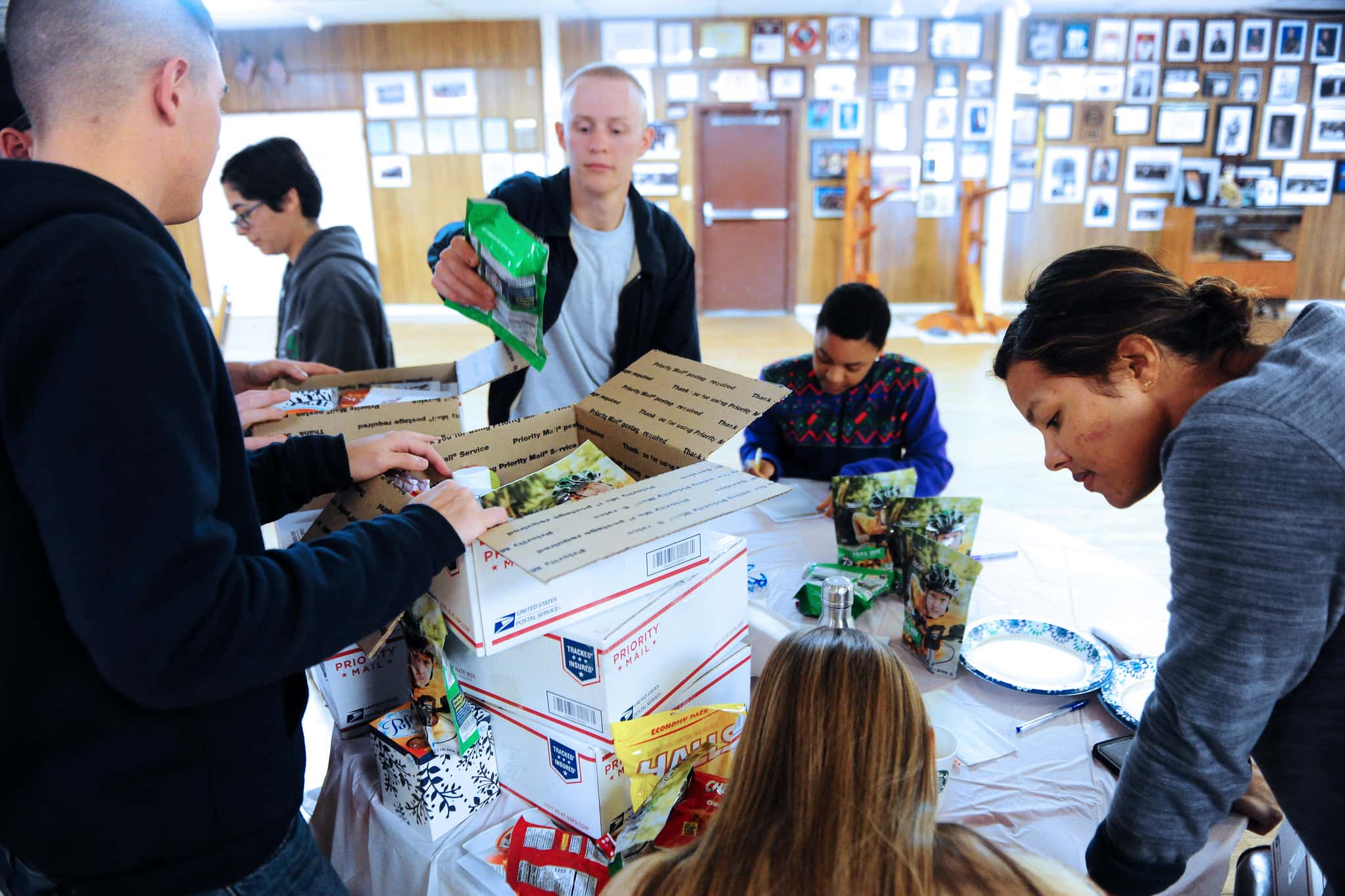 BOSS & Legion make care packages for troops