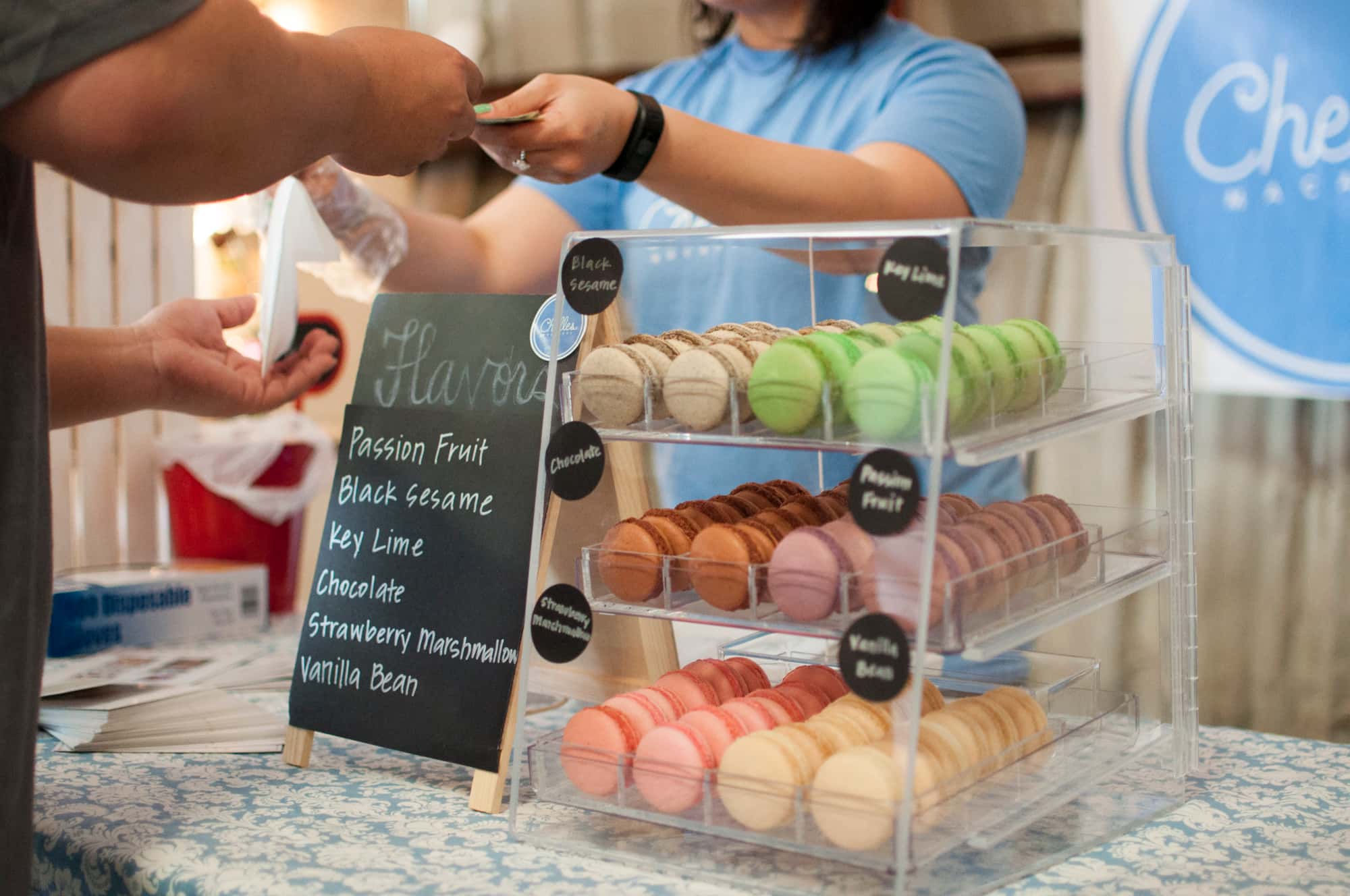 Canva - Black Sesame Key Lime Chocolate and Strawberry Macarons in a Glass Display