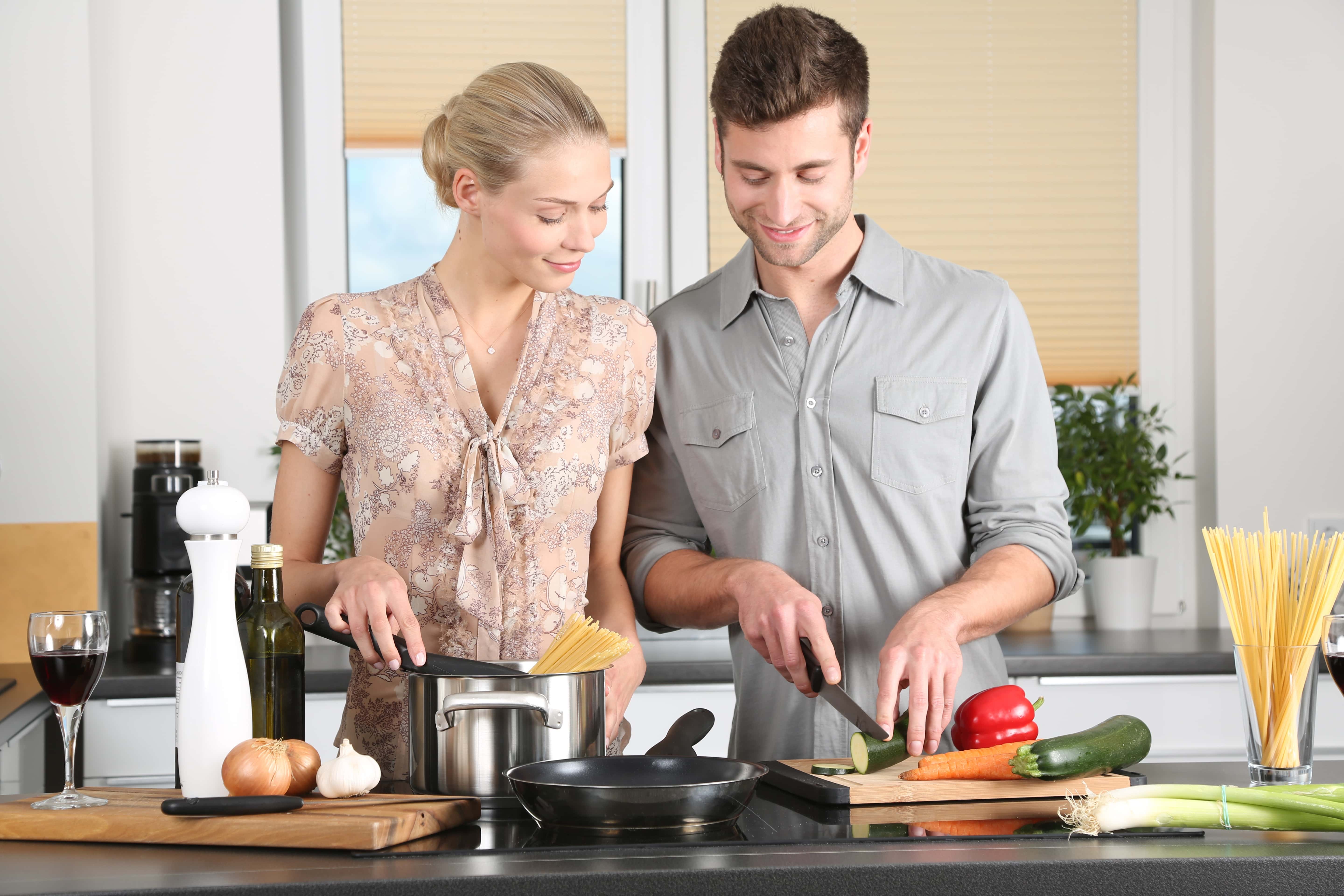 Canva - Couple Cooking