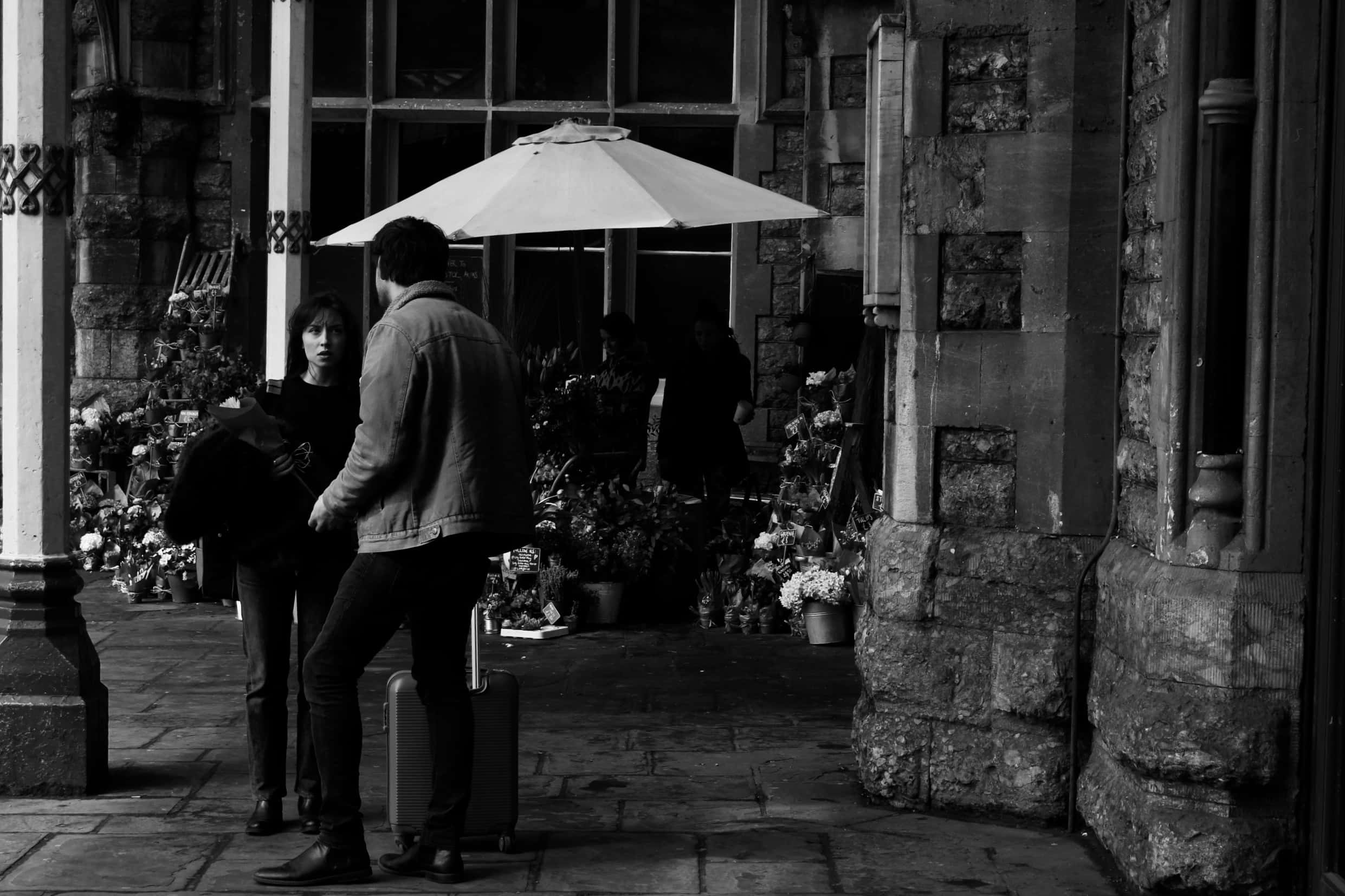 Canva - Grayscale Photography of Man Standing Beside Woman