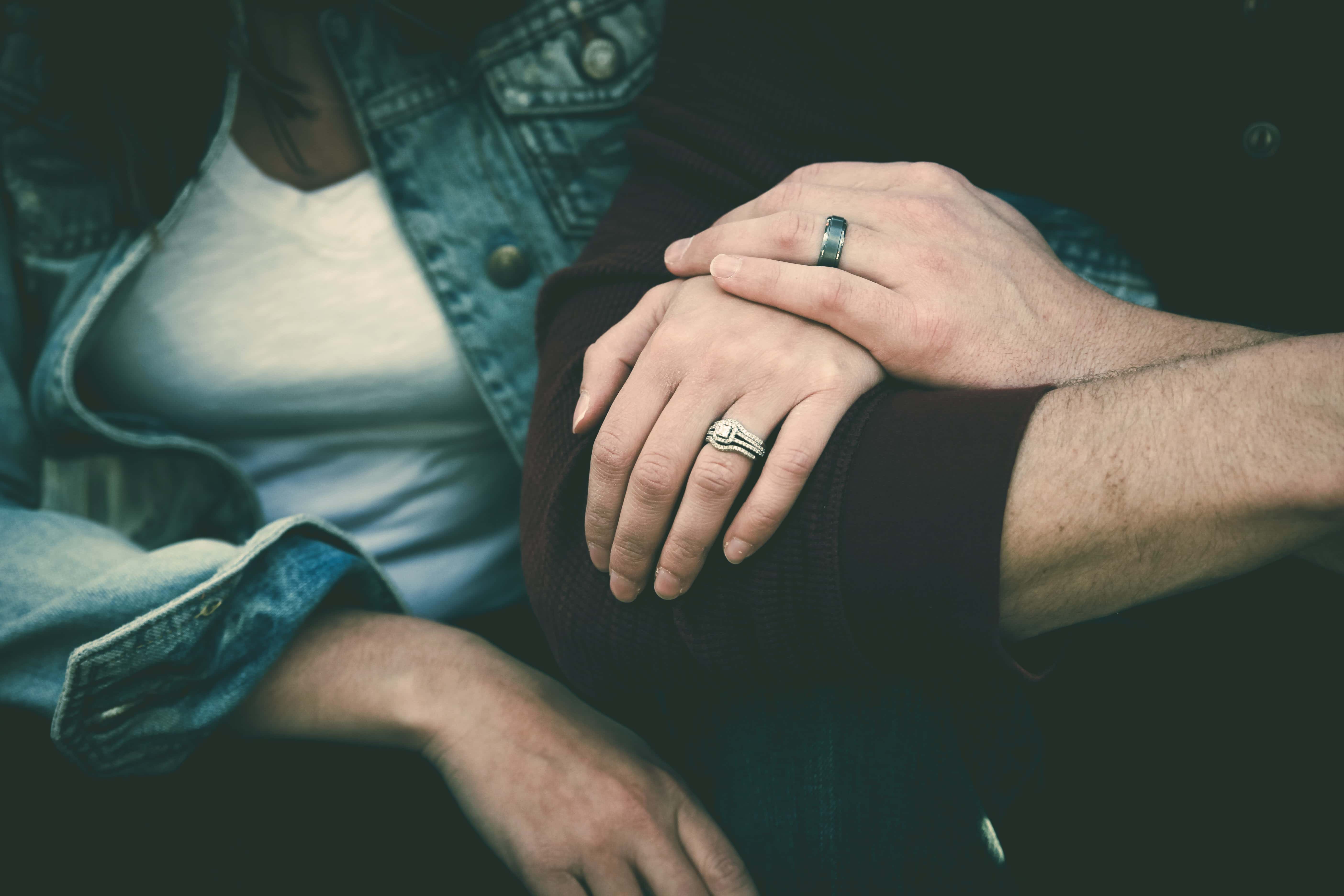 Canva - Man and Woman Couple Wearing Their Silver Couple Bond Ring