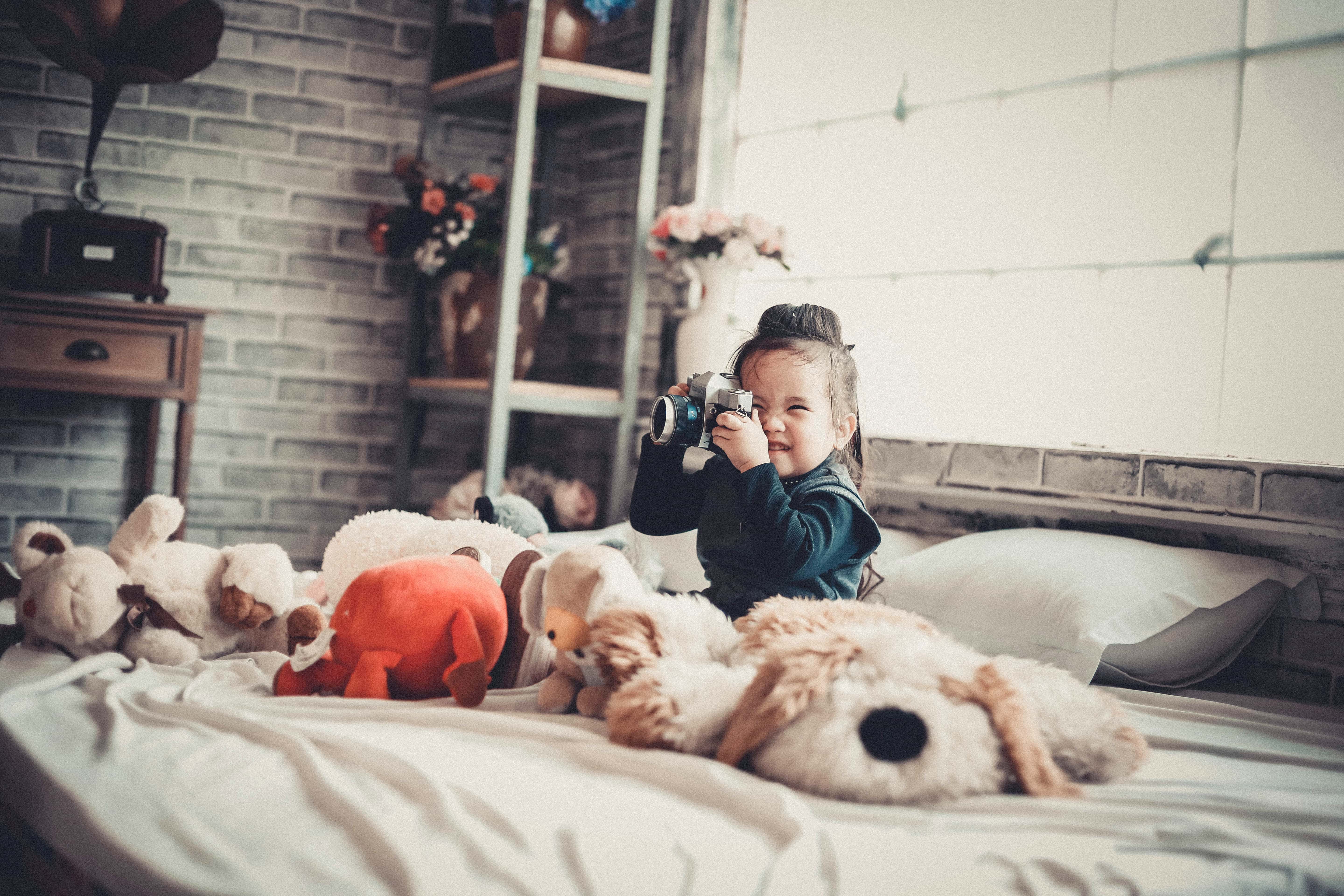 Canva - Photo of a Girl Playing With the Camera
