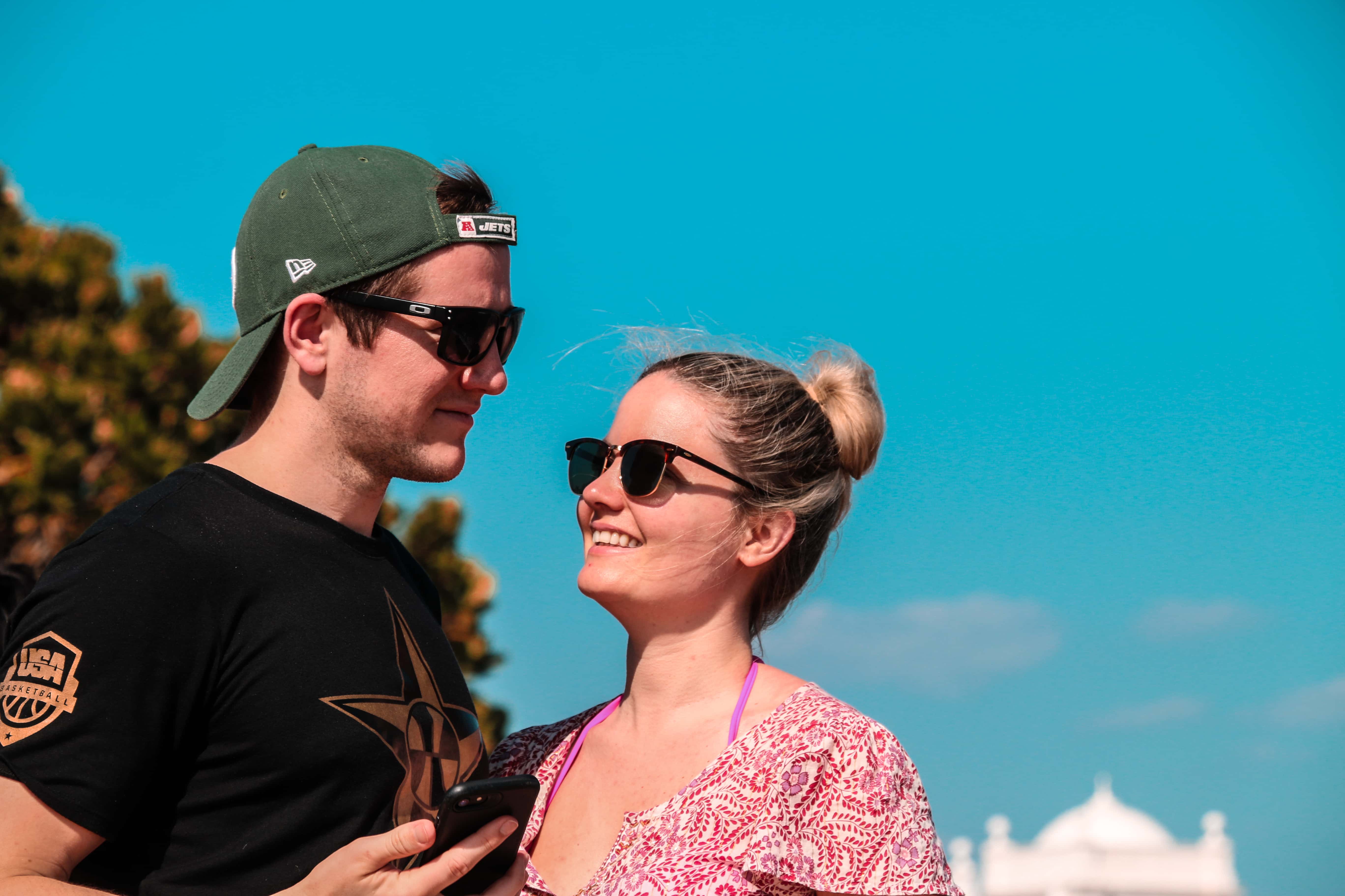 Canva - Selective Focus Photo of Couple Stands Behind Green Tree at Daytime