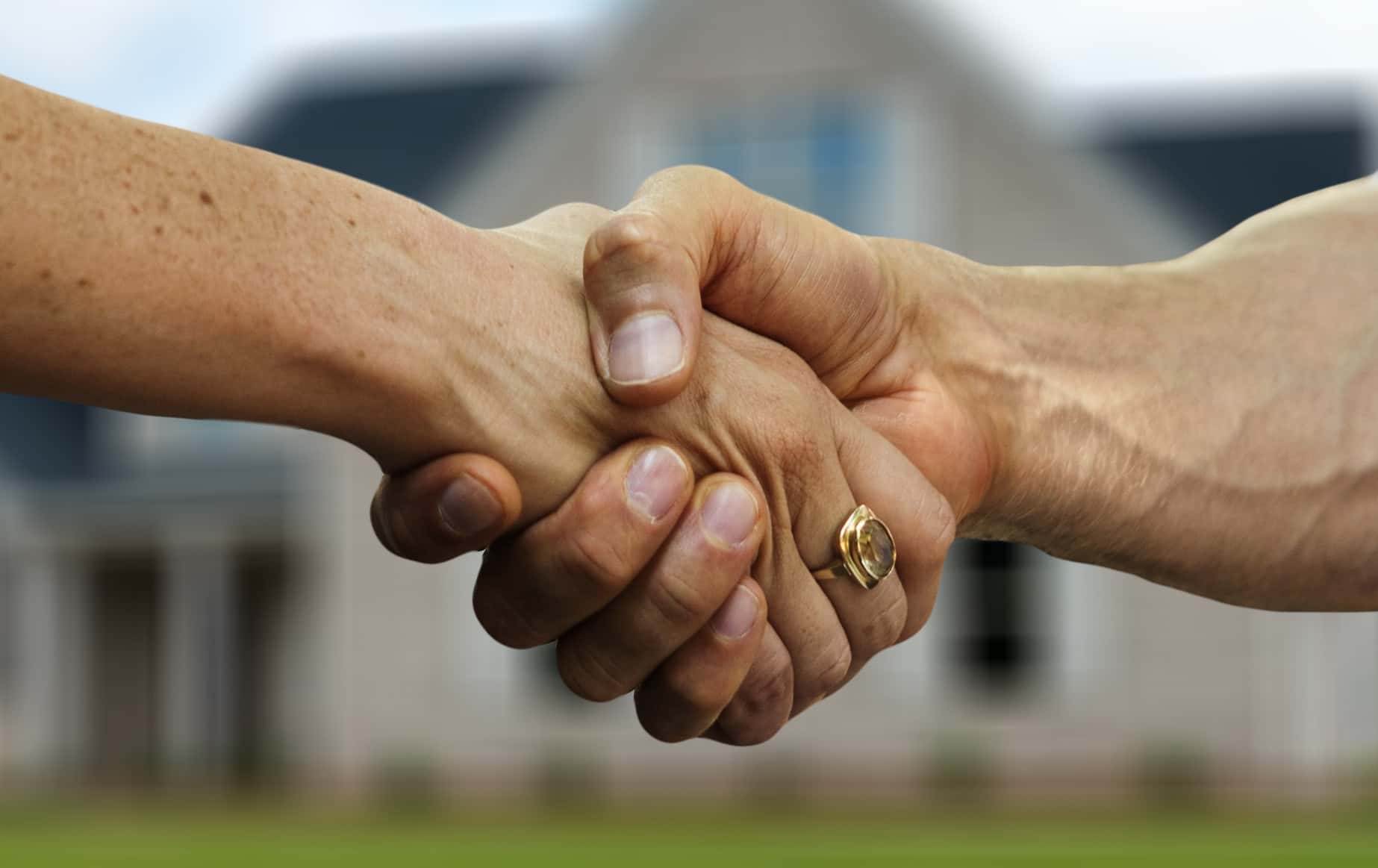 Canva - Shaking Hands After Selling a House(1)