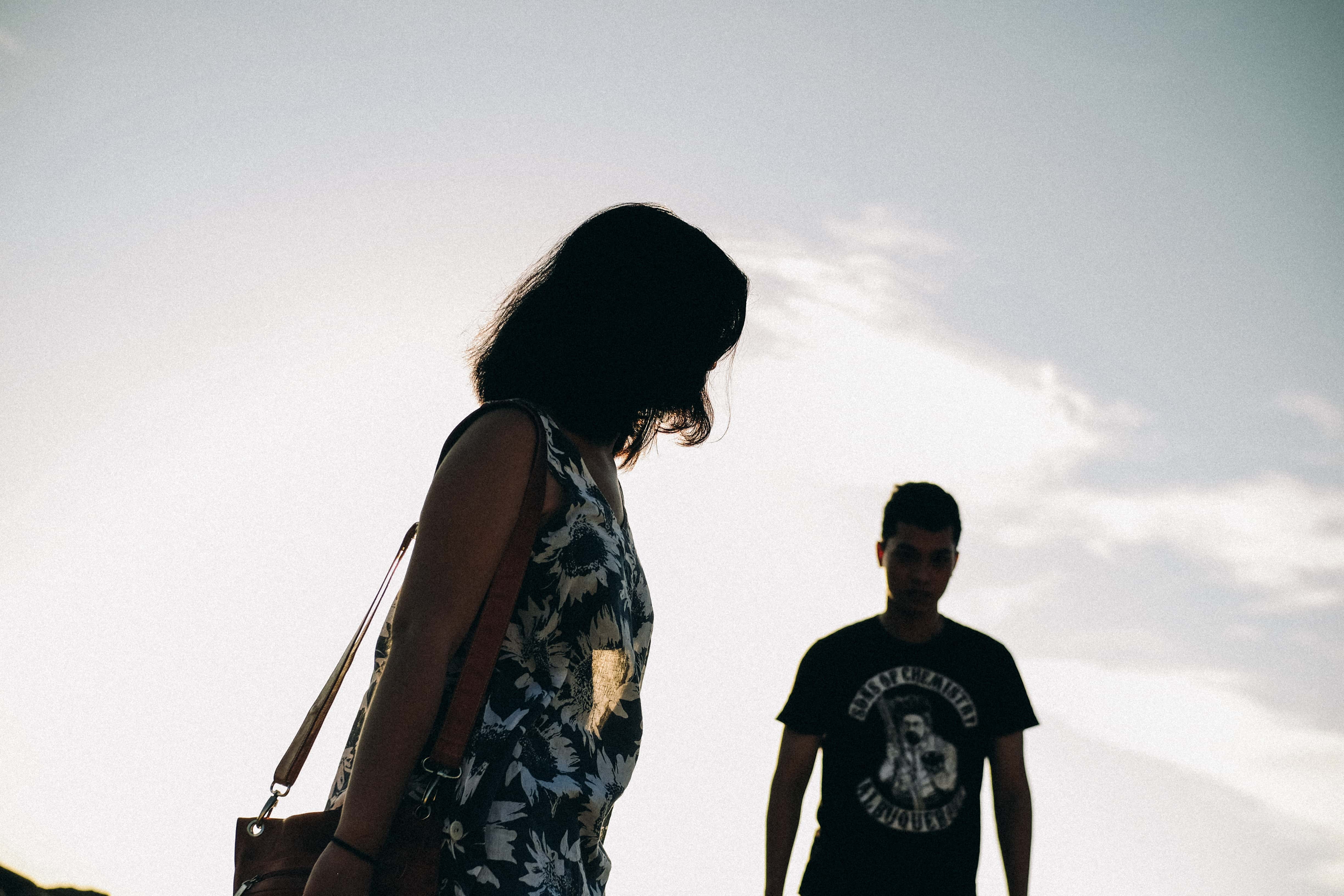 Canva - Silhouette of Man and Woman