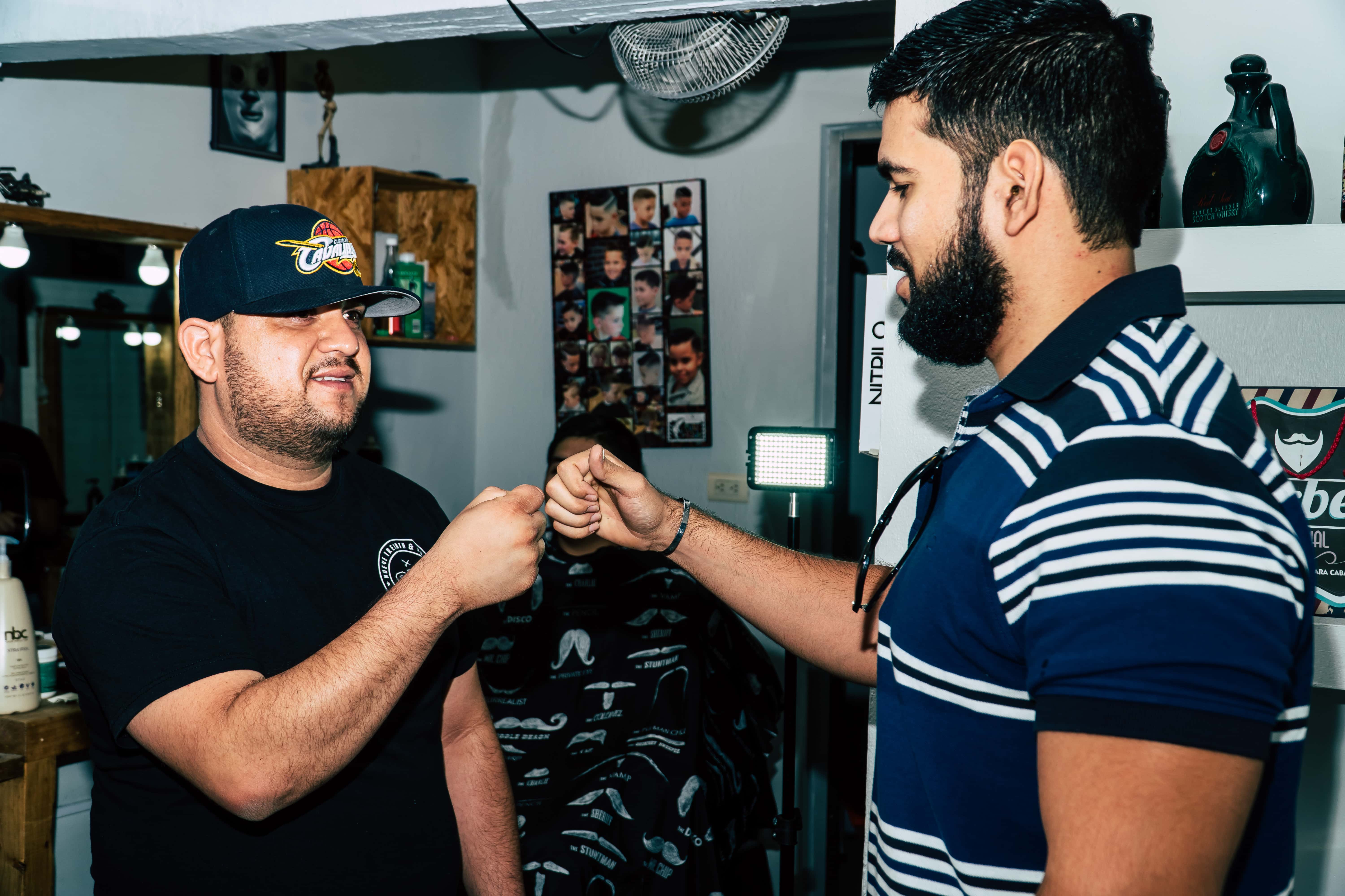 Canva - Two Bearded Man Giving Each Other Fist Bump