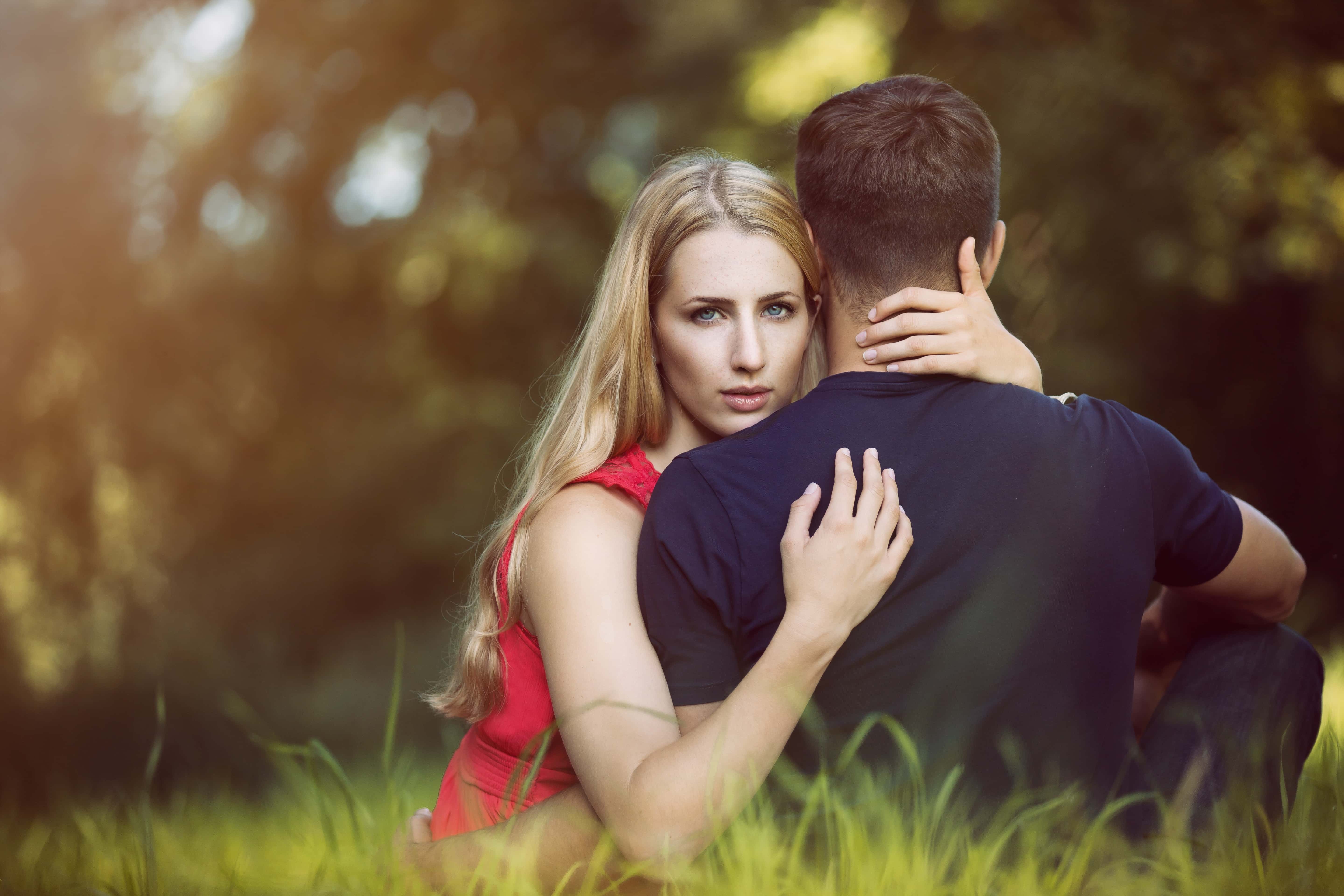 Canva - Woman Hugging on Man