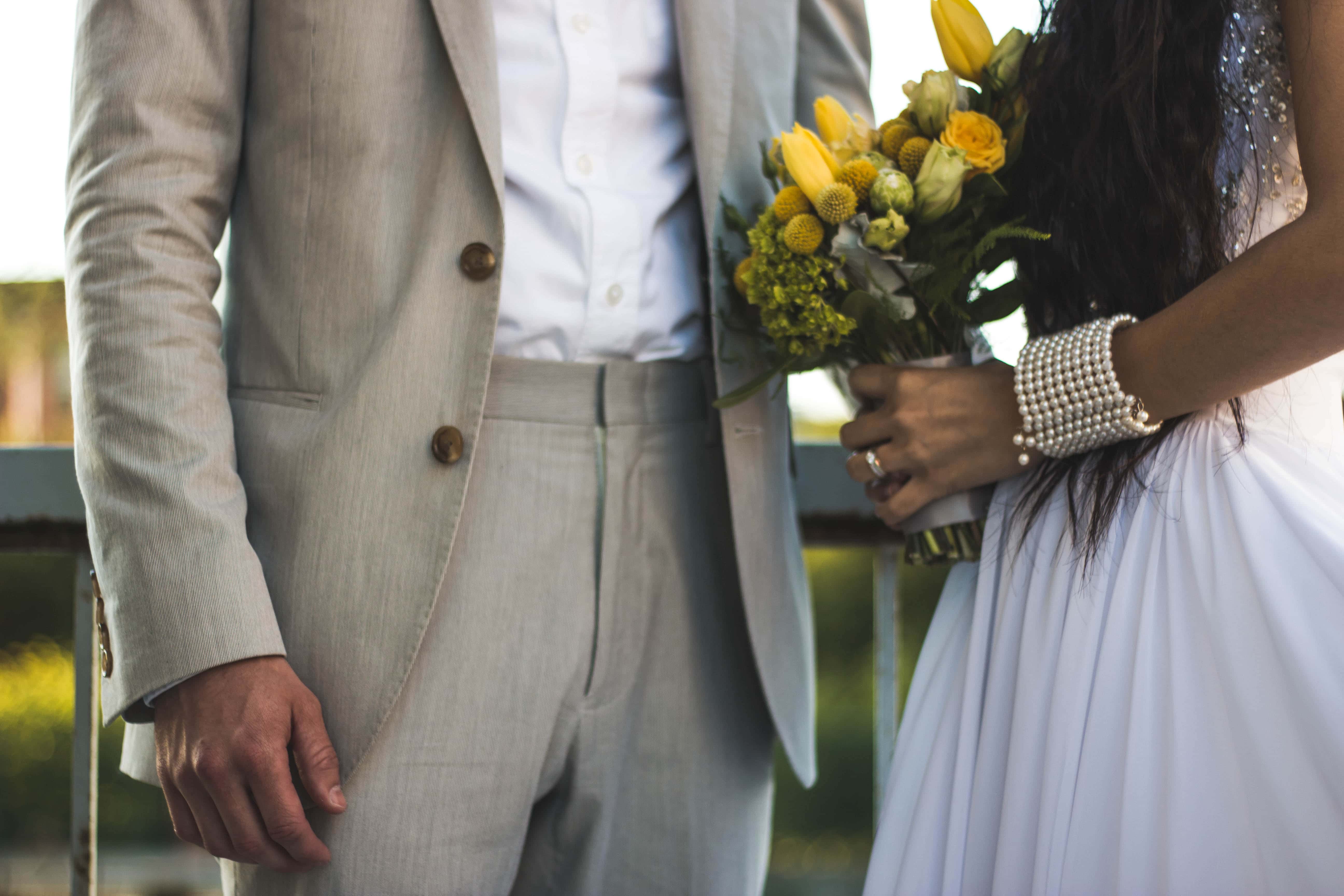 Canva - Woman Wearing White Dress And Holding Bouquet