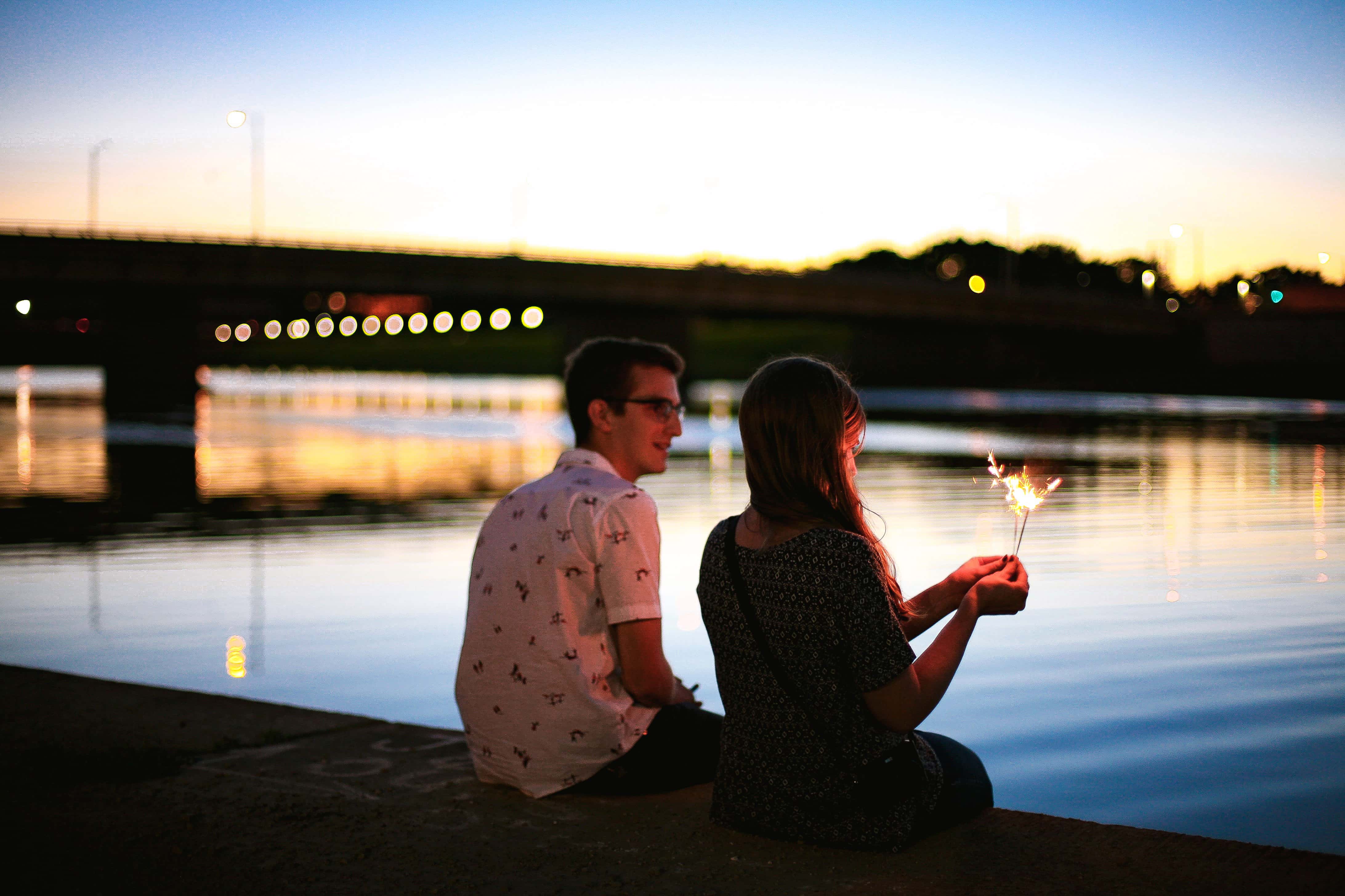 couple-sitting-by-the-river-in-dayton