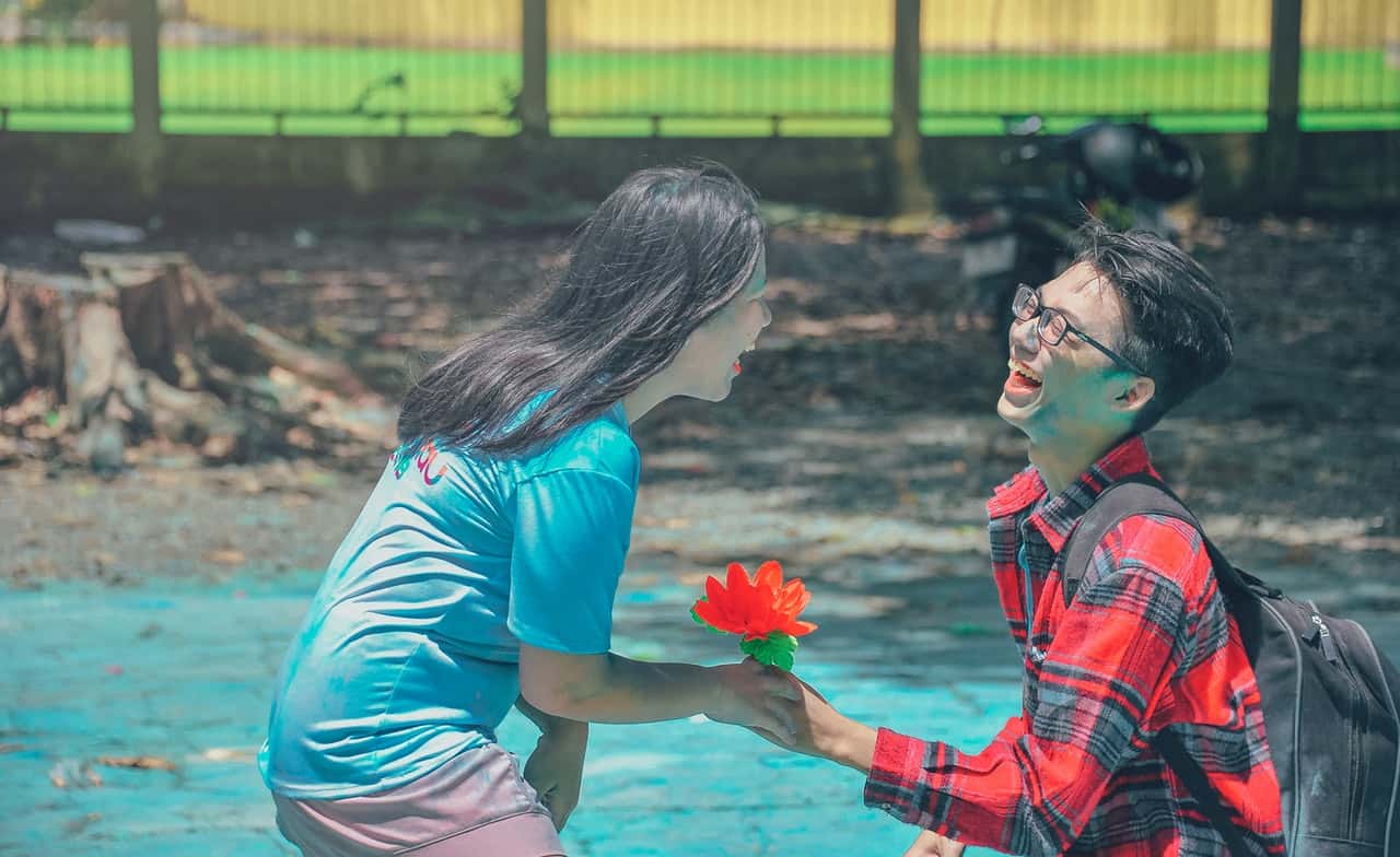 photography-of-a-man-and-woman-laughing-1165609