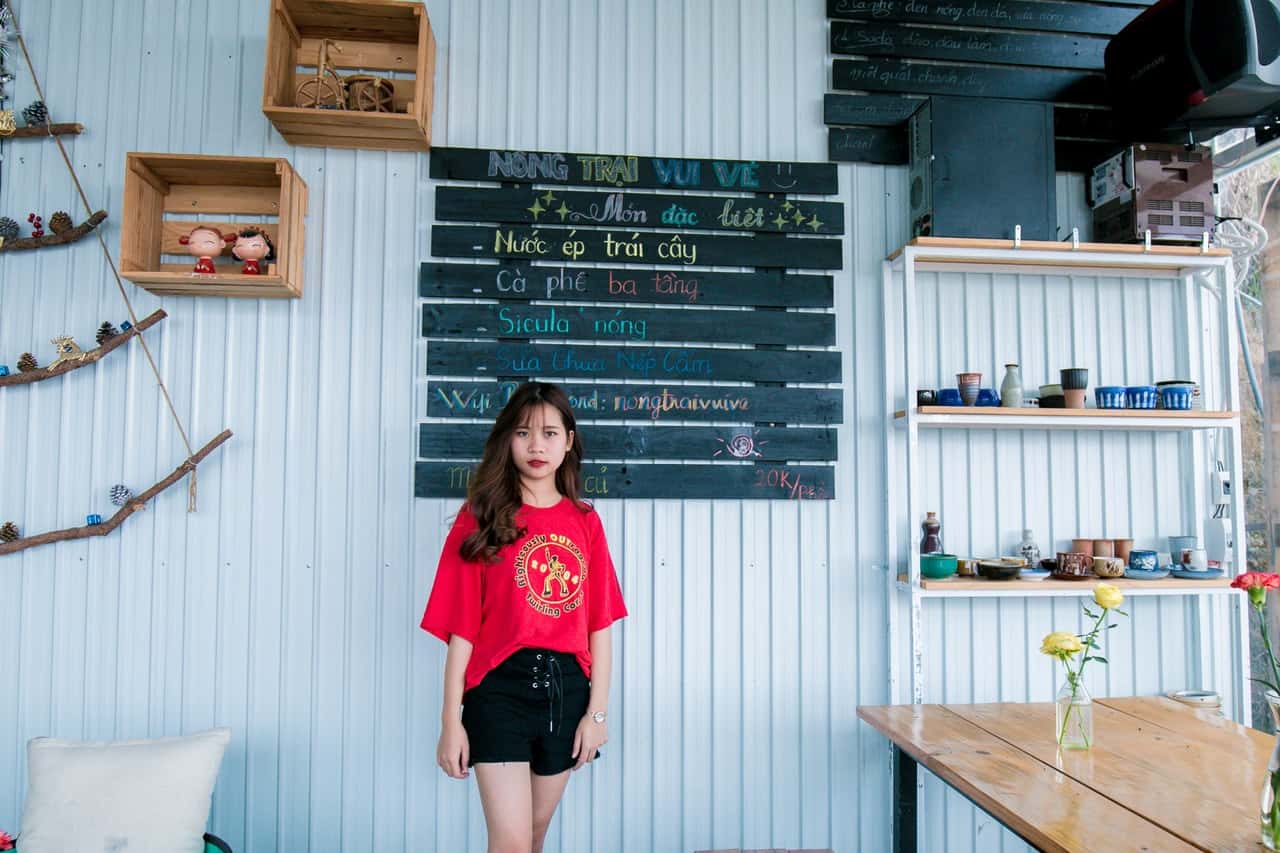 woman-in-red-crew-neck-t-shirt-and-black-short-shorts-1057175