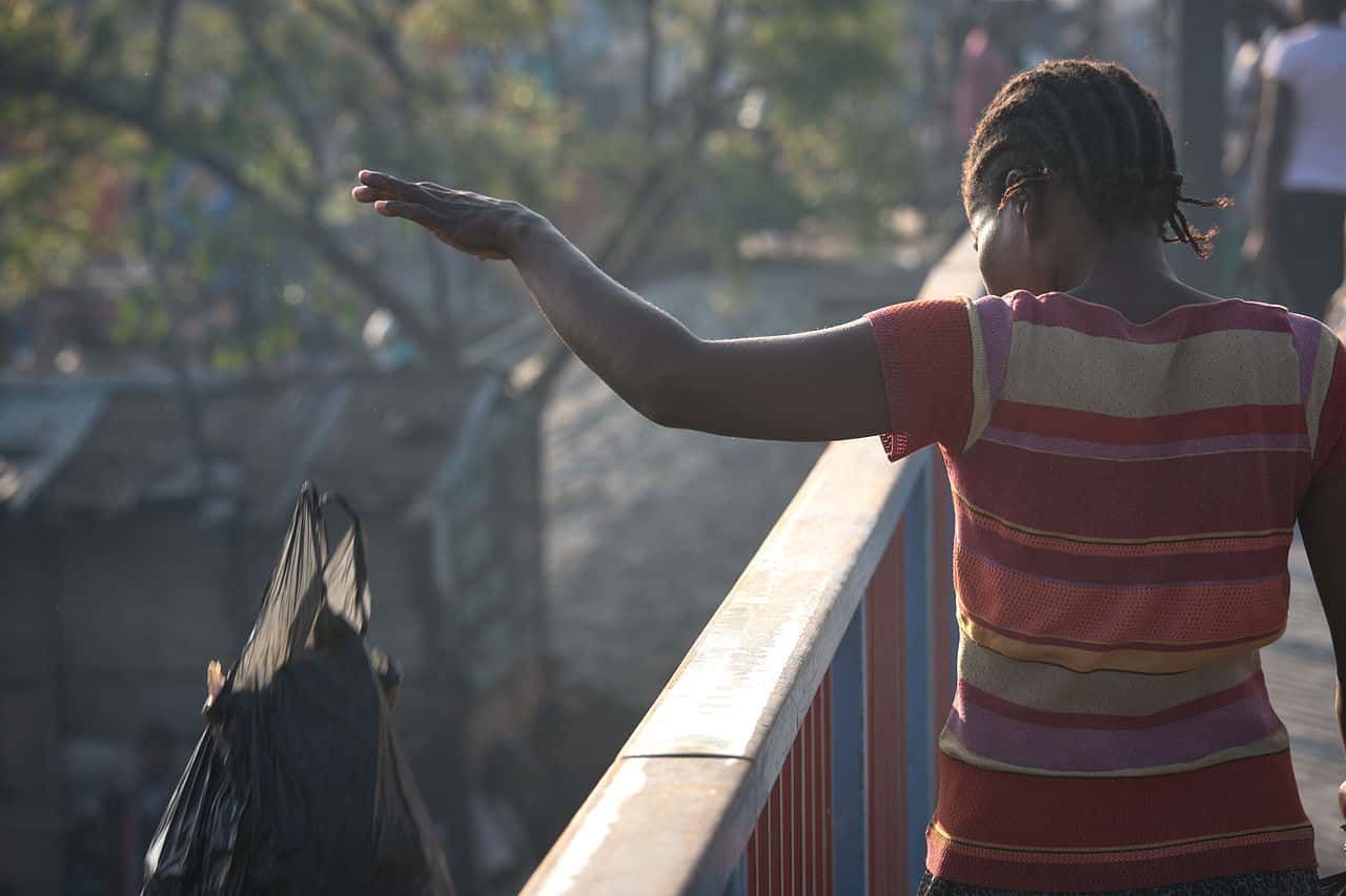 1280px-Throwing_Trash_Off_the_Bridge_(8540267715)