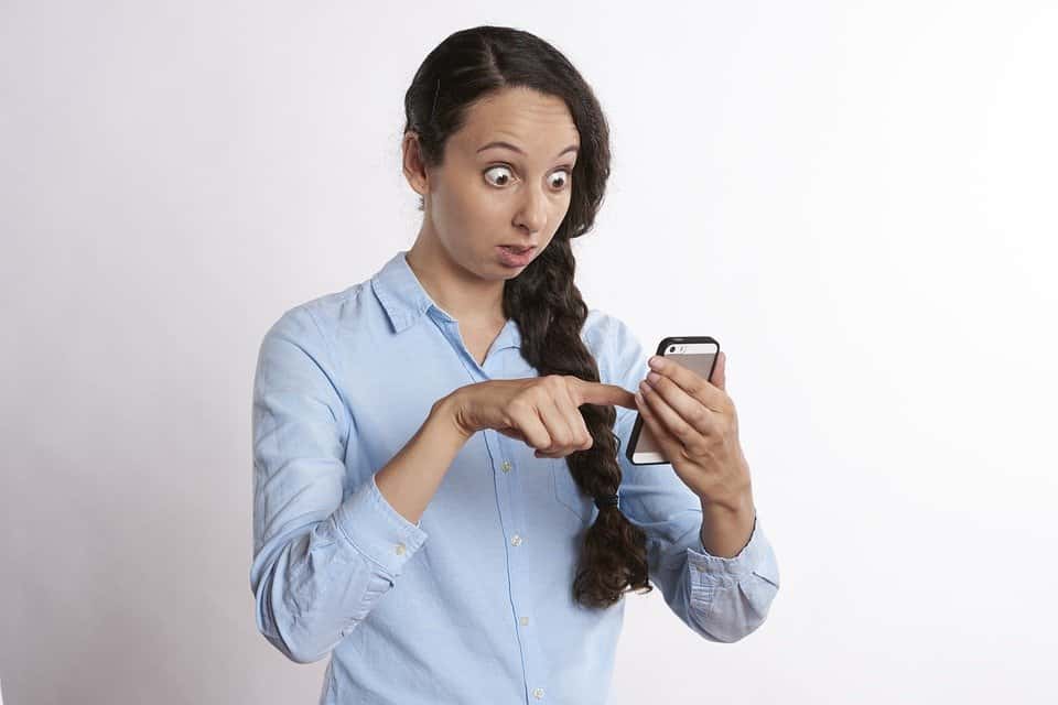 Anxious Smiling Surprise Looking Phone Texting