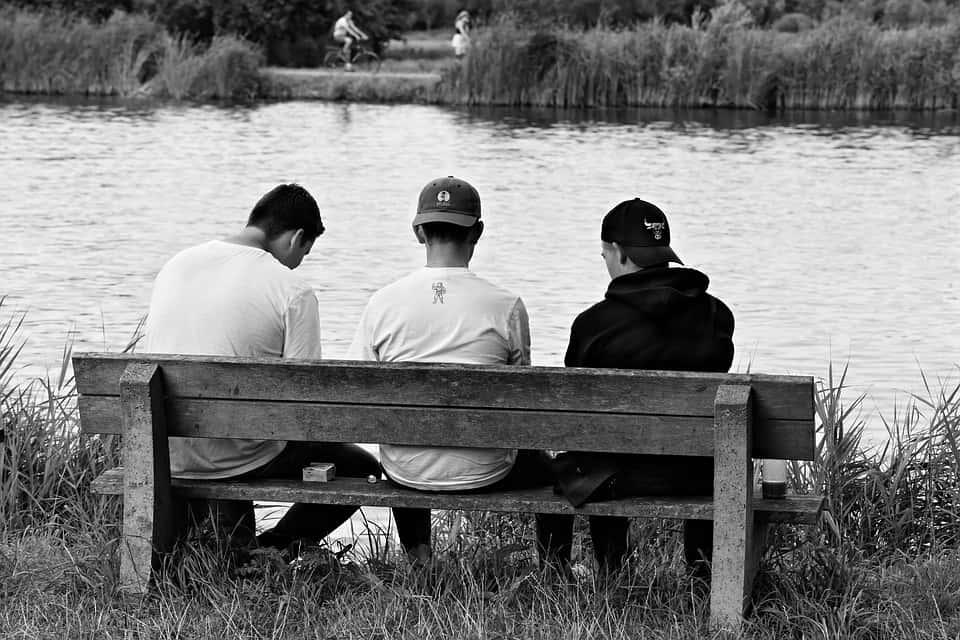 Three Guys Bench River Sitting Three Together Boy