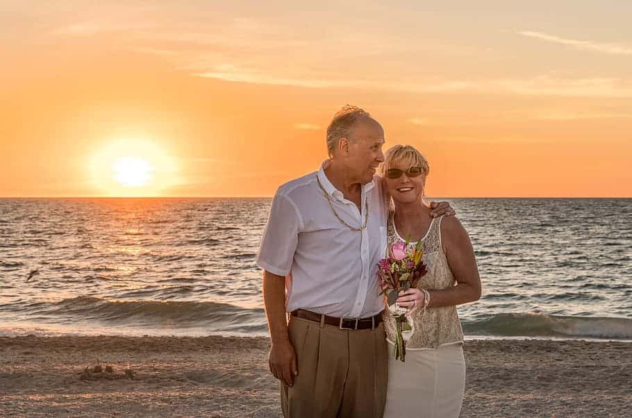 beach-wedding-happy-couple-sunset-ocean