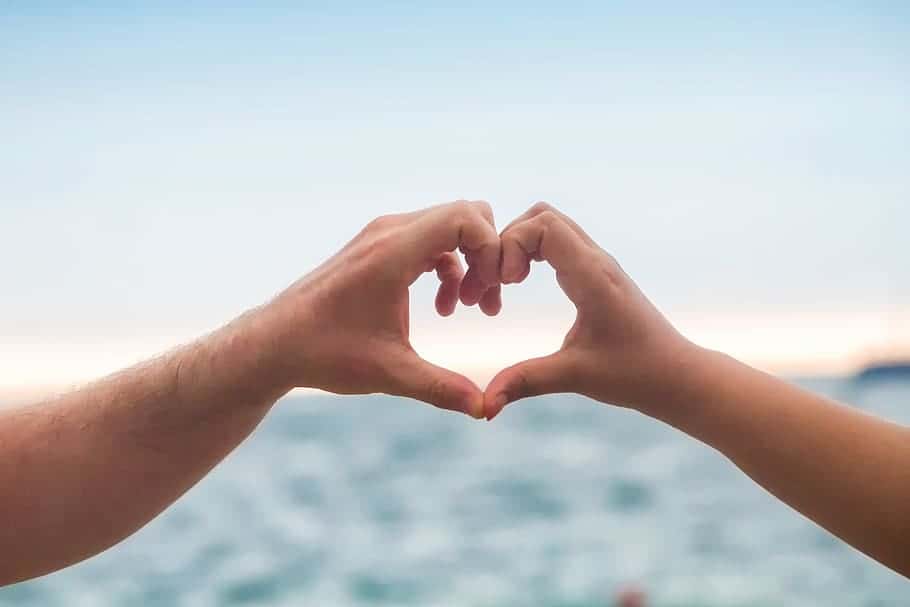 hands-love-ocean-blue