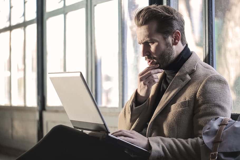 man-deep-thinking-computer-concerned-beard