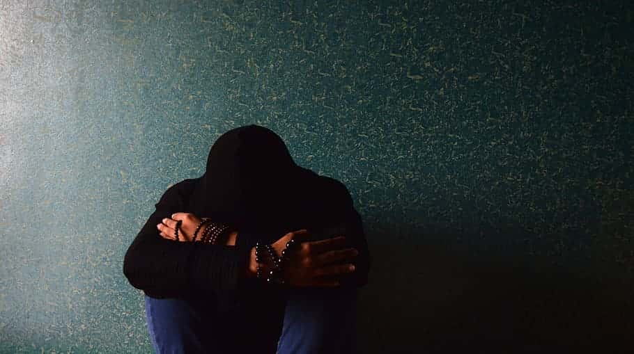 man-depressed-hoodie-unhappy