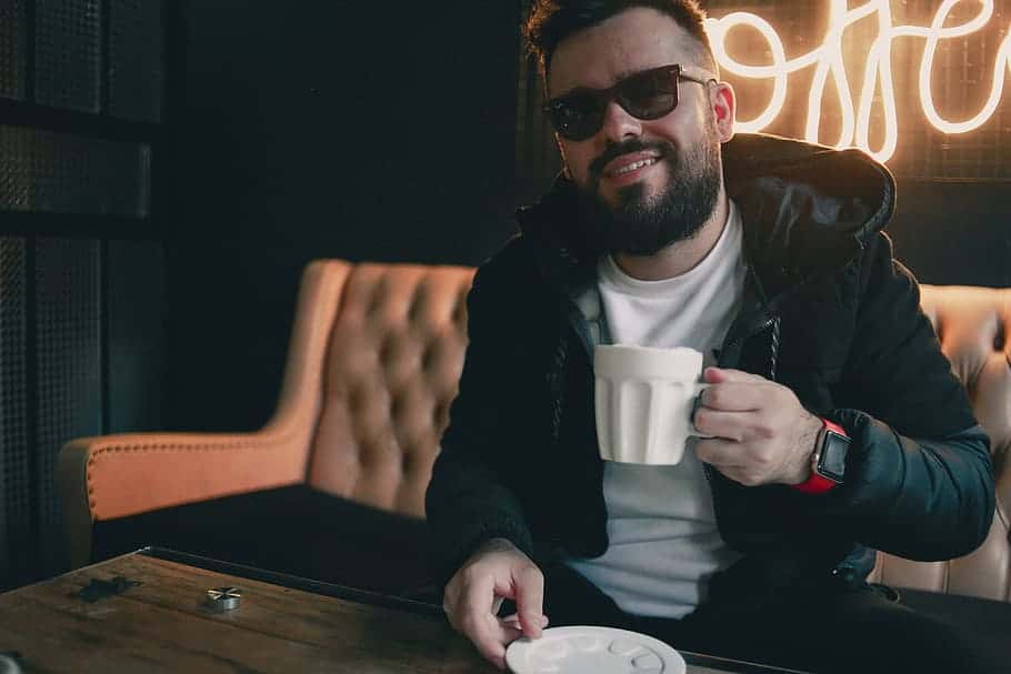 man-drinking-coffee-cafe