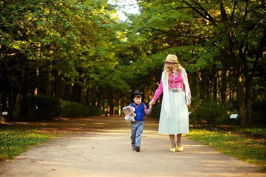 park-mother-and-son-family-stroll