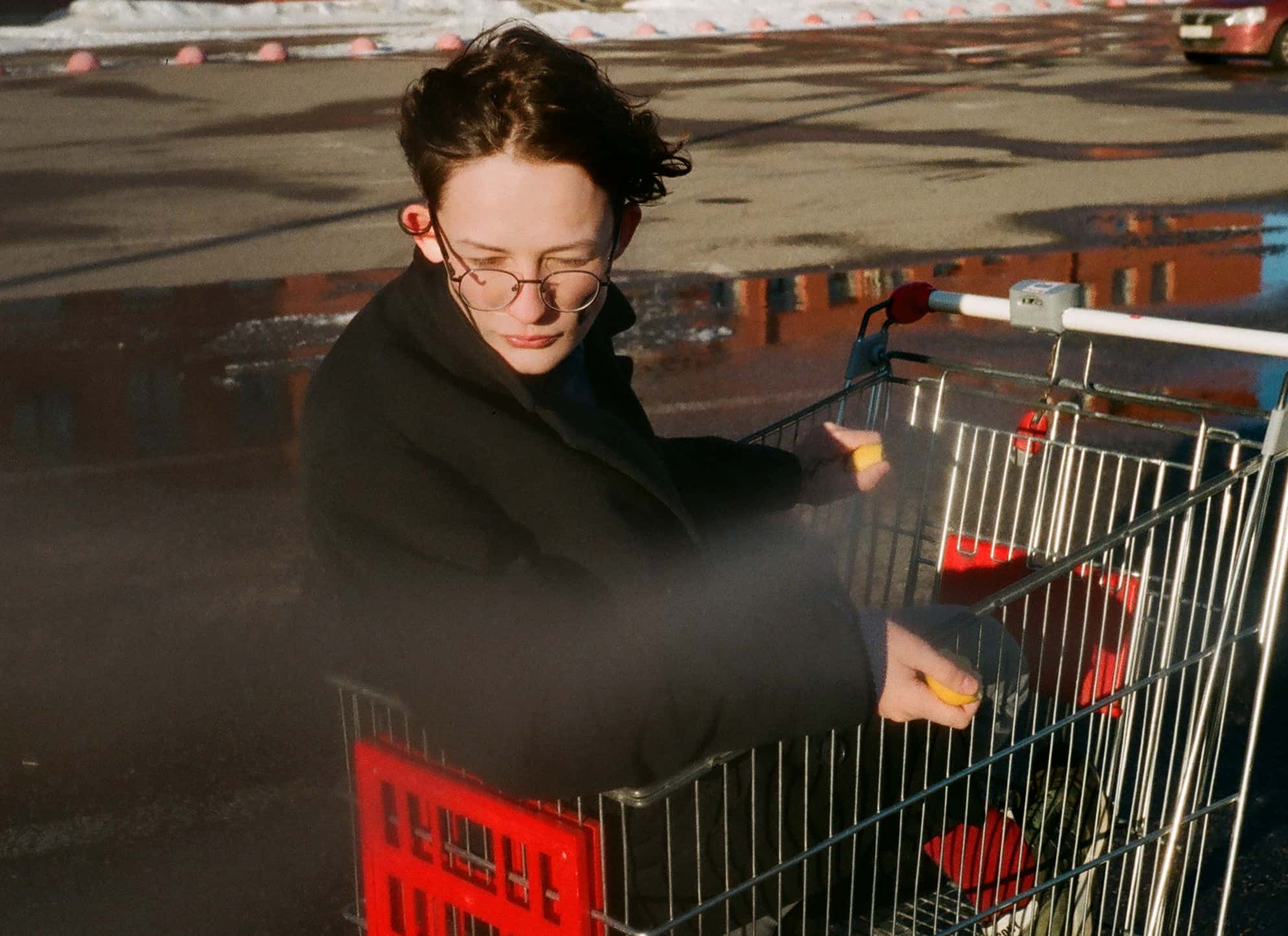 person-riding-on-shopping-cart-2062272