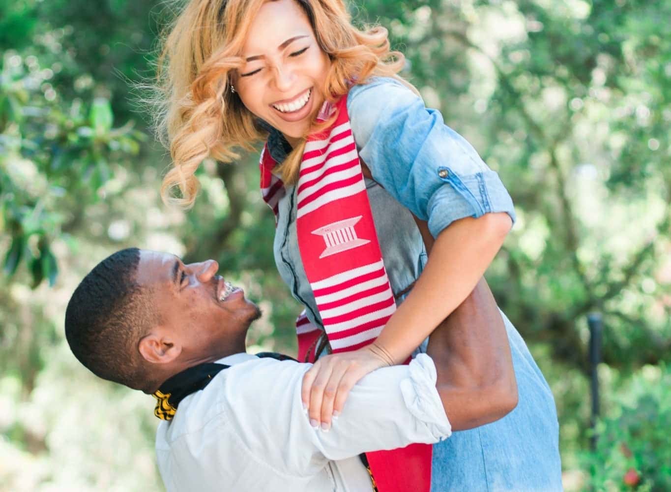photo-of-man-lifting-woman-near-tree-935961(1)