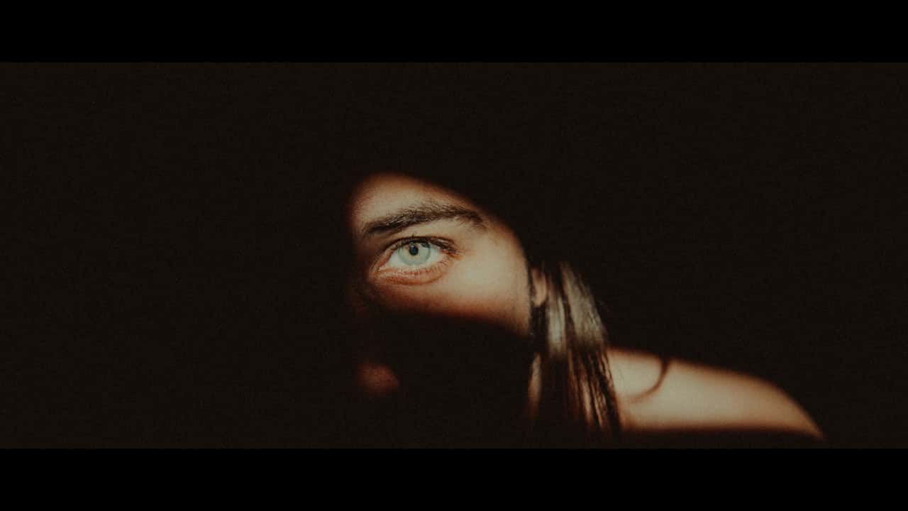 woman-hiding-in-the-dark-2971181