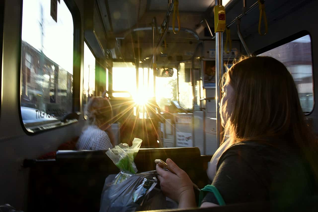 1280px-(1)Woman_on_bus-1