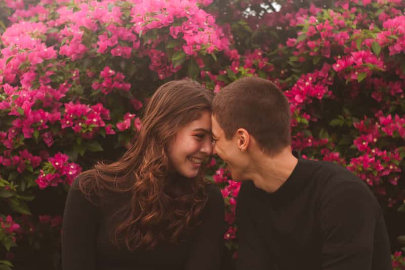 Canva - Man And Woman Beside Pink Flowering Plant