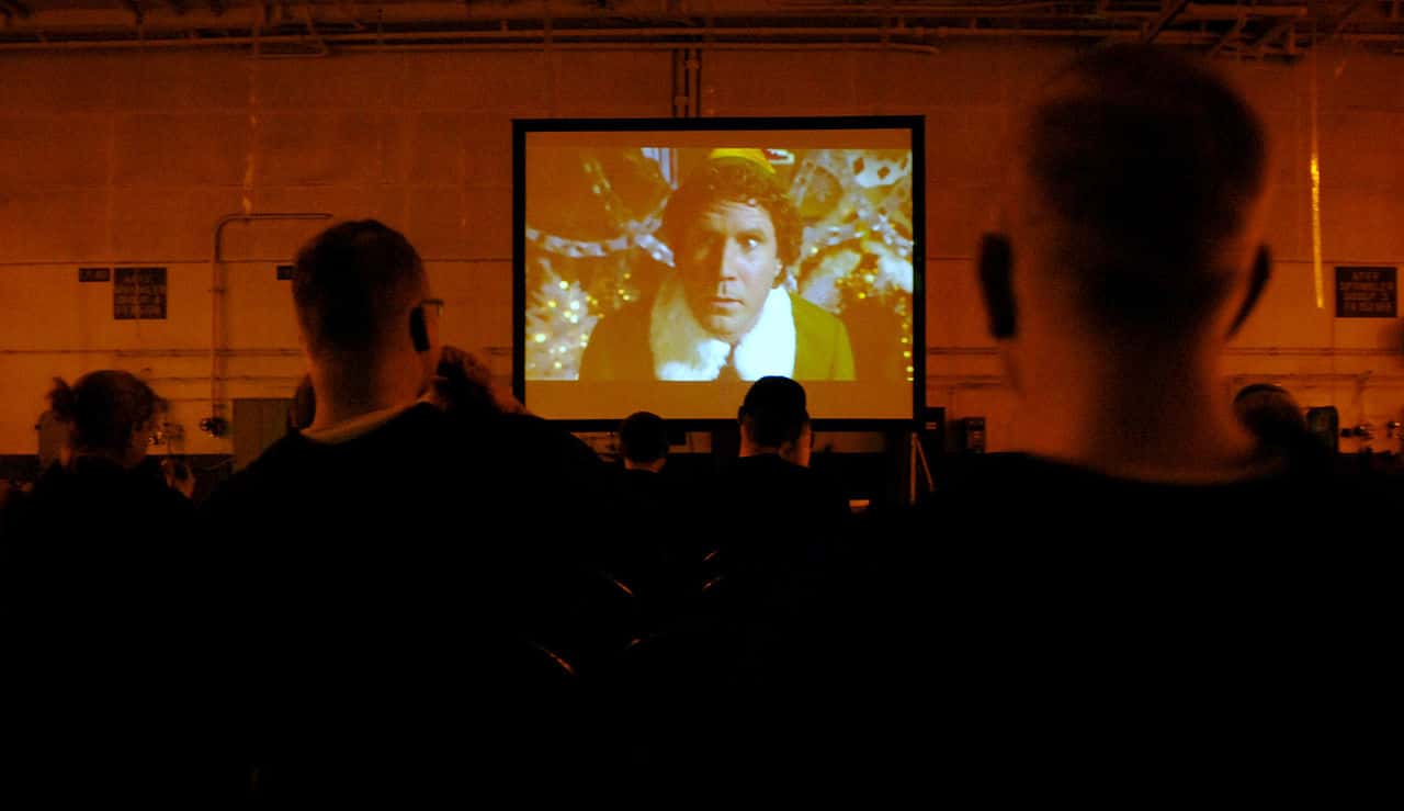 US_Navy_061217-N-0336C-052_Sailors_relax_while_watching_the_Christmas_movie